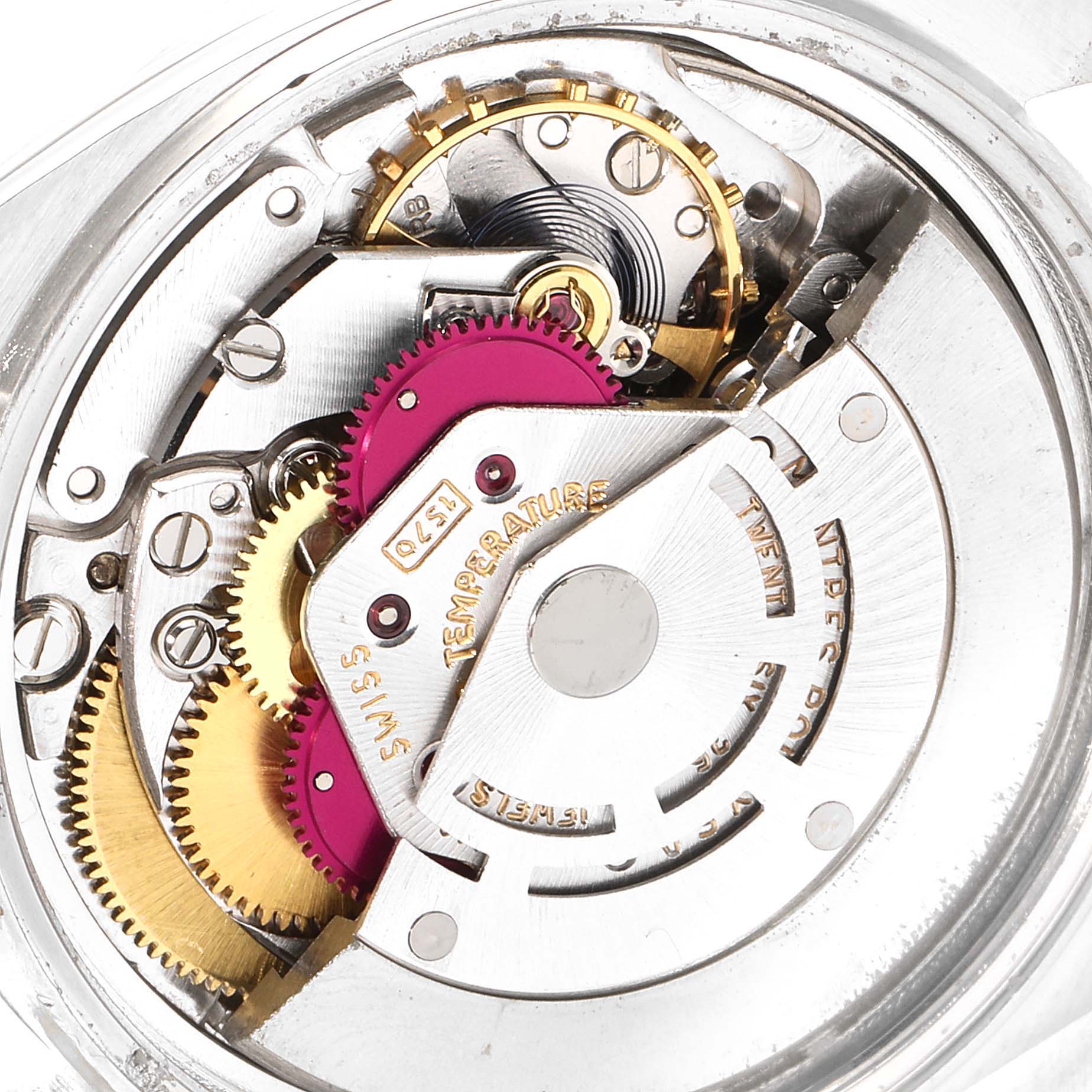 This close-up shot of the Rolex Vintage Collection 1603 Men
s Stainless Steel Silver Dial 1603 Men
s Stainless Steel Silver Dial watch displays its intricate internal movement components.