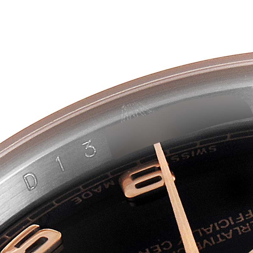 The image shows a close-up of the Datejust model by Rolex, highlighting the dial and part of the minute hand.