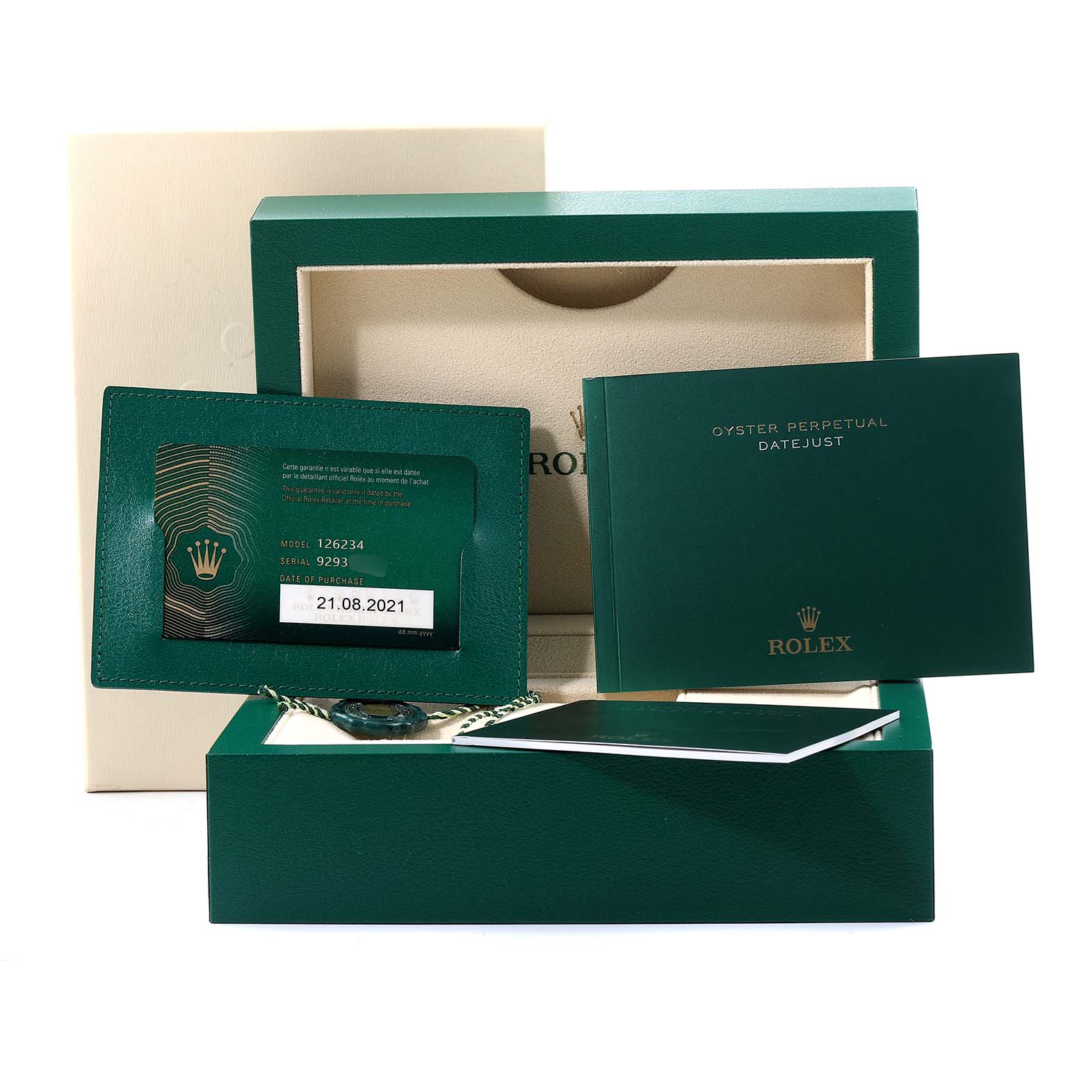 The image shows the Rolex Datejust 126234 Men's Stainless Steel White Dial 126234 Men's Stainless Steel White Dial watch accessories, including the warranty card, certificate, and manuals arranged in an open box.