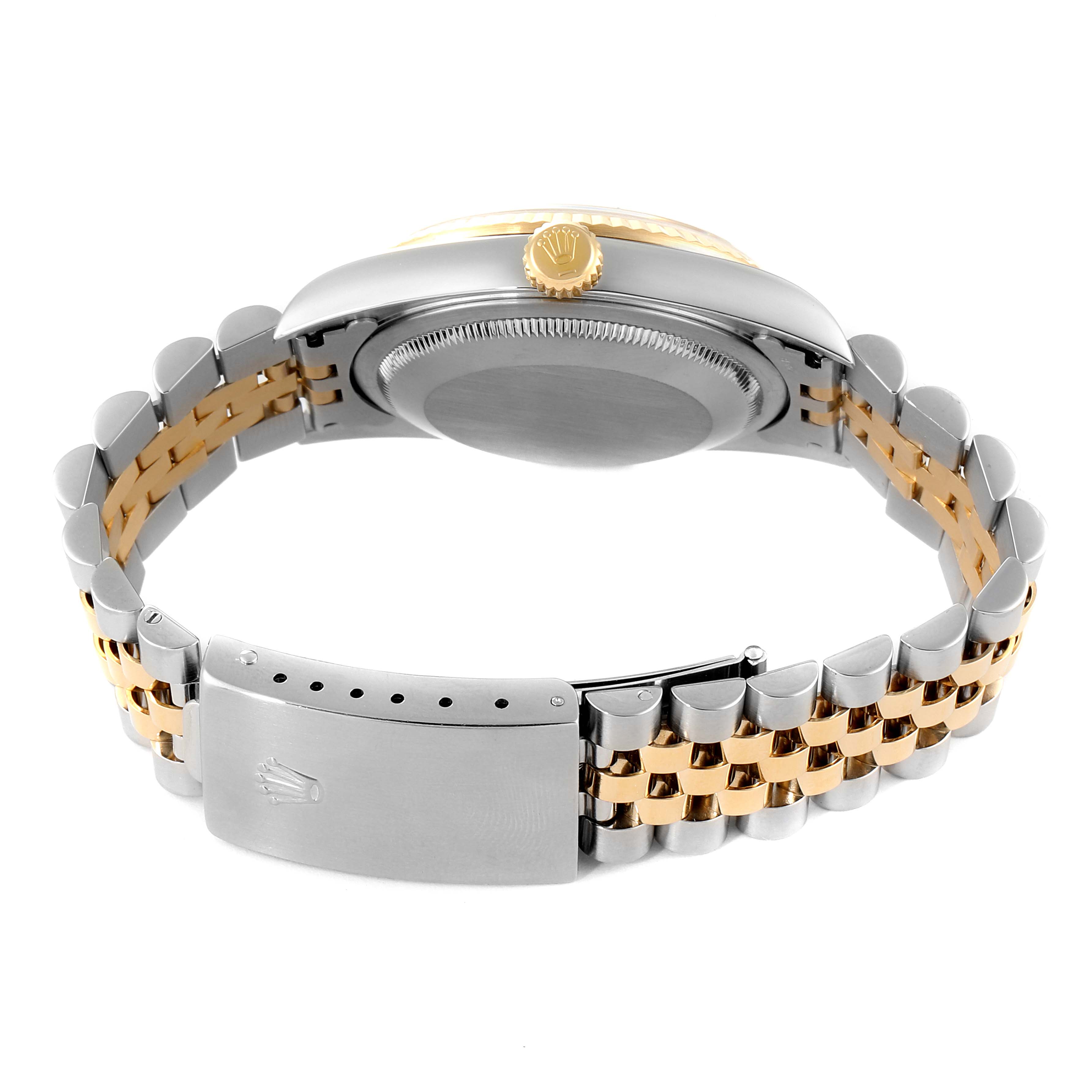 This image shows the back case and clasp of a Rolex Datejust 16233 Men's Steel and Gold (two tone) Champagne Dial 16233 Men's Steel and Gold (two tone) Champagne Dial watch from a rear angle.