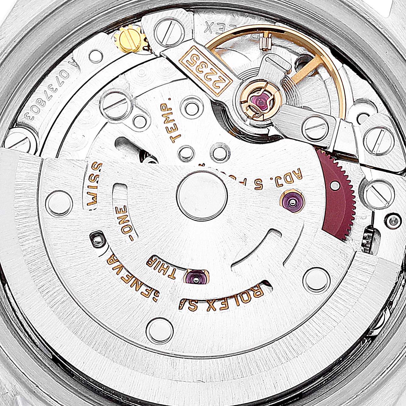 This image shows the internal mechanism of a Rolex Datejust 79163 Women's Steel and Gold (two tone) Grey Dial 79163 Women's Steel and Gold (two tone) Grey Dial watch, specifically the automatic movement and rotor.