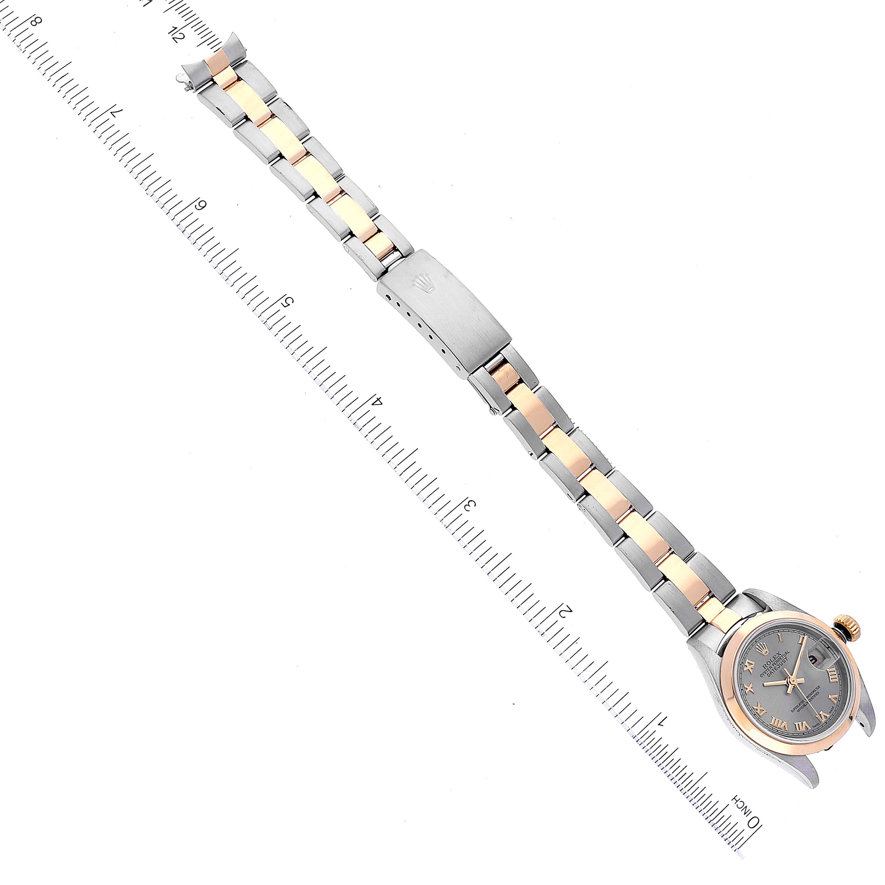 This image shows a Rolex Datejust 79163 Women's Steel and Gold (two tone) Grey Dial 79163 Women's Steel and Gold (two tone) Grey Dial watch at a diagonal angle, focusing on its face and two-tone bracelet.