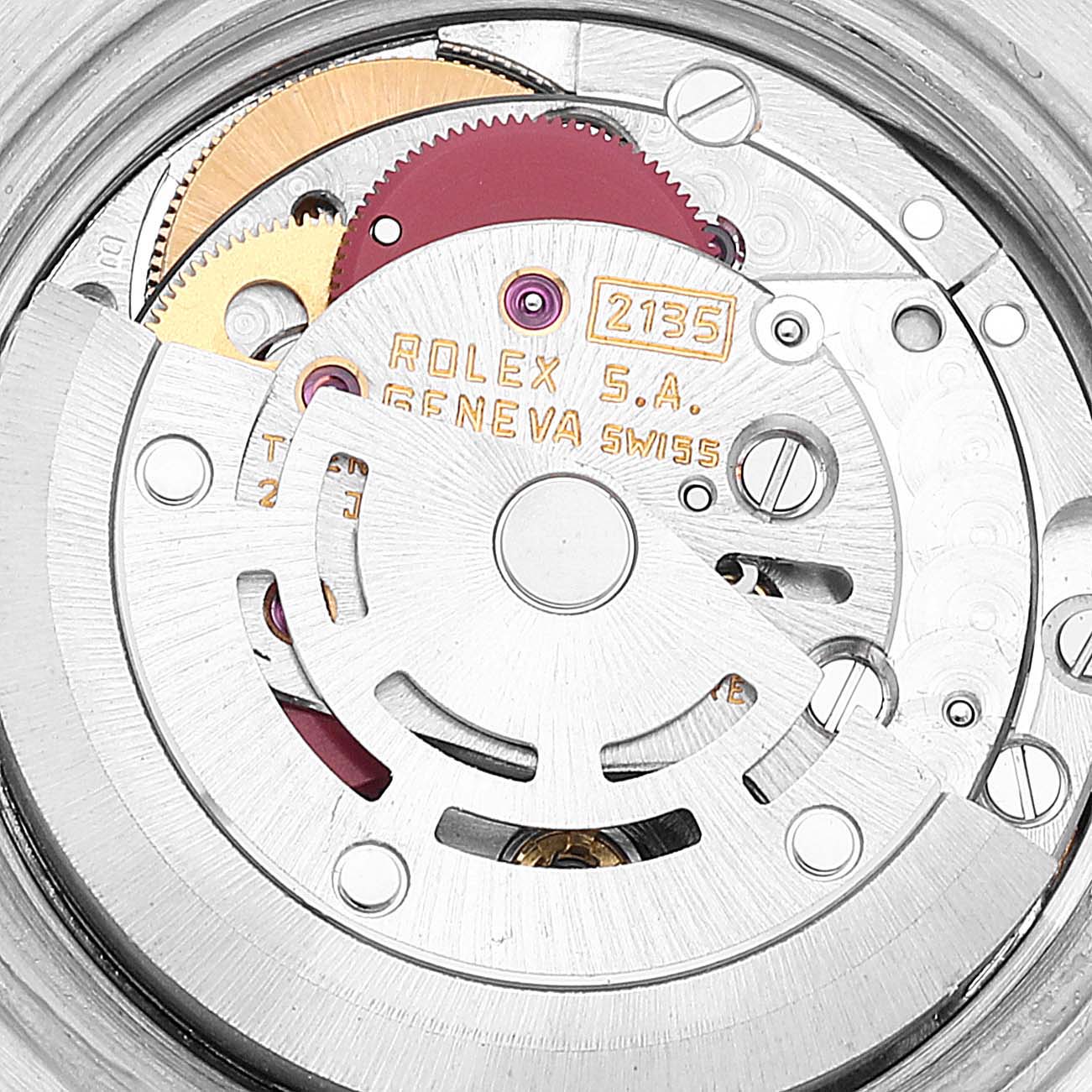 The close-up image shows the intricate inner mechanism and parts of a Rolex Datejust 69173 Women's Steel and Gold (two tone) White Dial 69173 Women's Steel and Gold (two tone) White Dial watch movement.