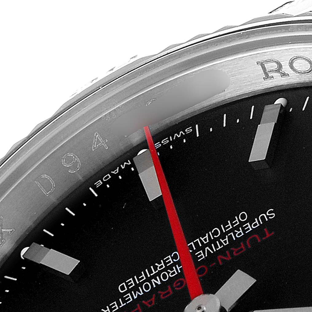 The image shows a close-up angled view of the dial and bezel area of a Rolex Turn-o-Graph 116264 Men
s Stainless Steel Black Dial 116264 Men
s Stainless Steel Black Dial, highlighting markers and a red second hand.