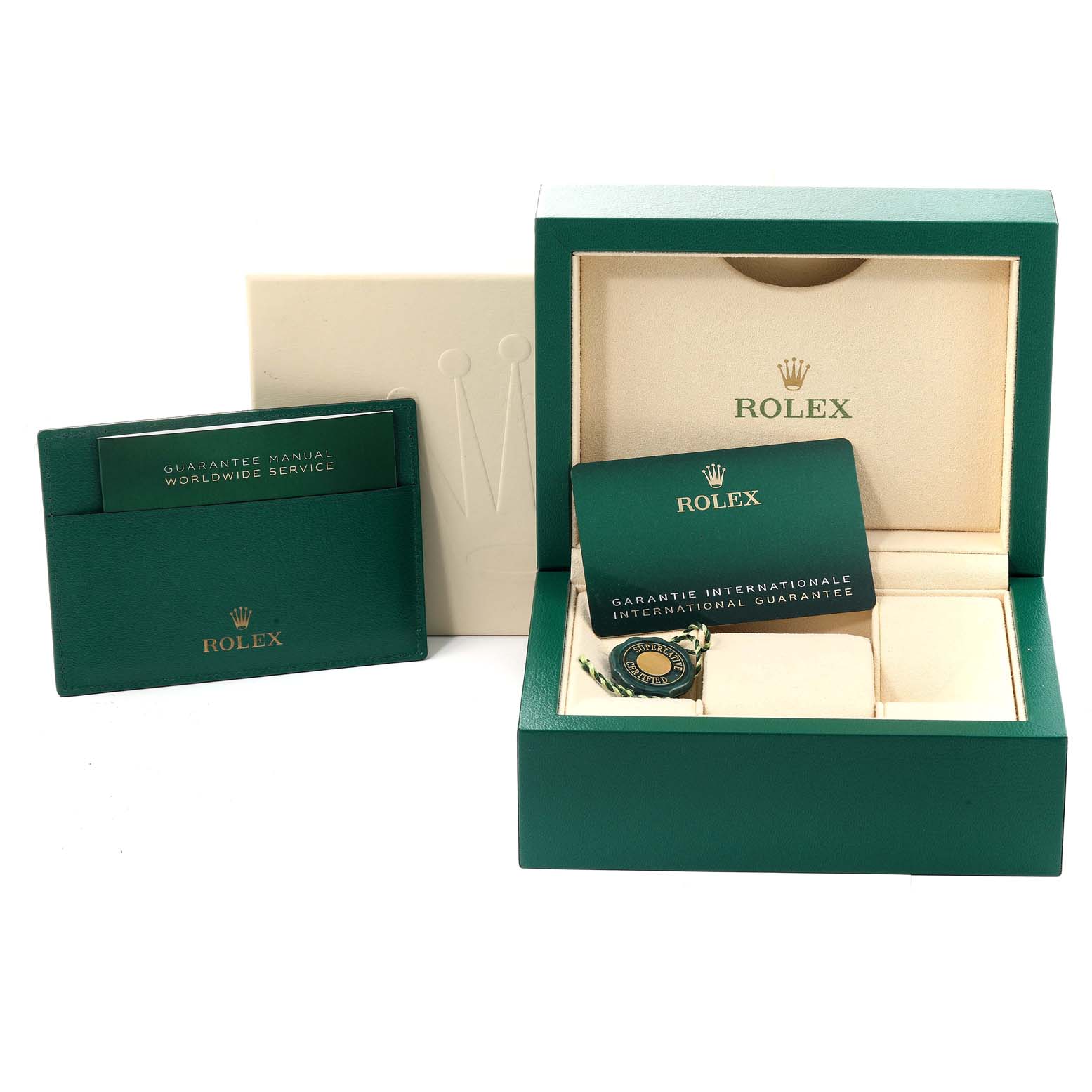 The image shows the packaging and accessories of a Rolex Explorer 124270 Men
s Stainless Steel Black Dial 124270 Men
s Stainless Steel Black Dial watch, including a guarantee manual and international guarantee card.