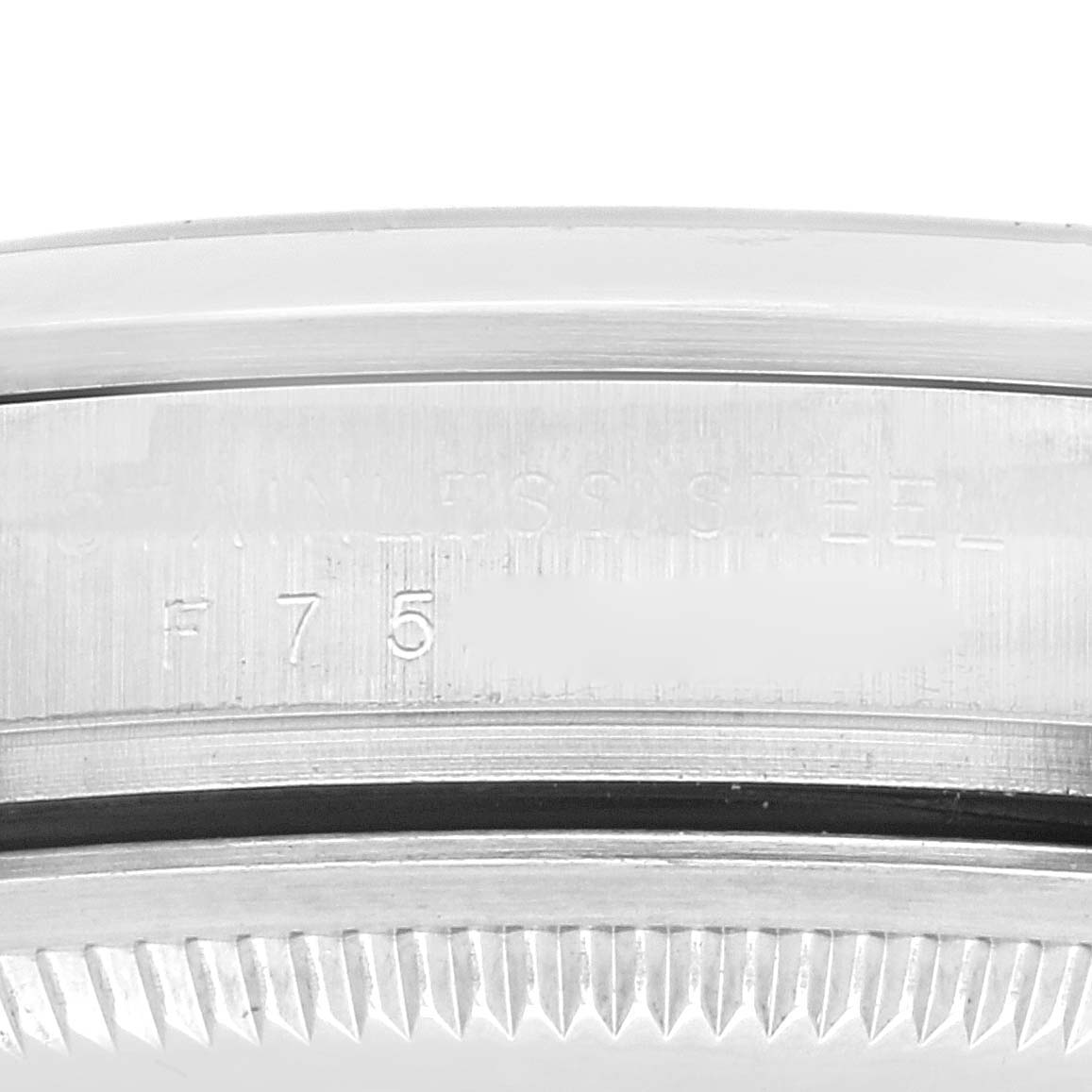 The image shows a close-up of the side view of the caseback and the bezel of a Rolex Explorer 114270 Men's Stainless Steel Black Dial 114270 Men's Stainless Steel Black Dial watch.