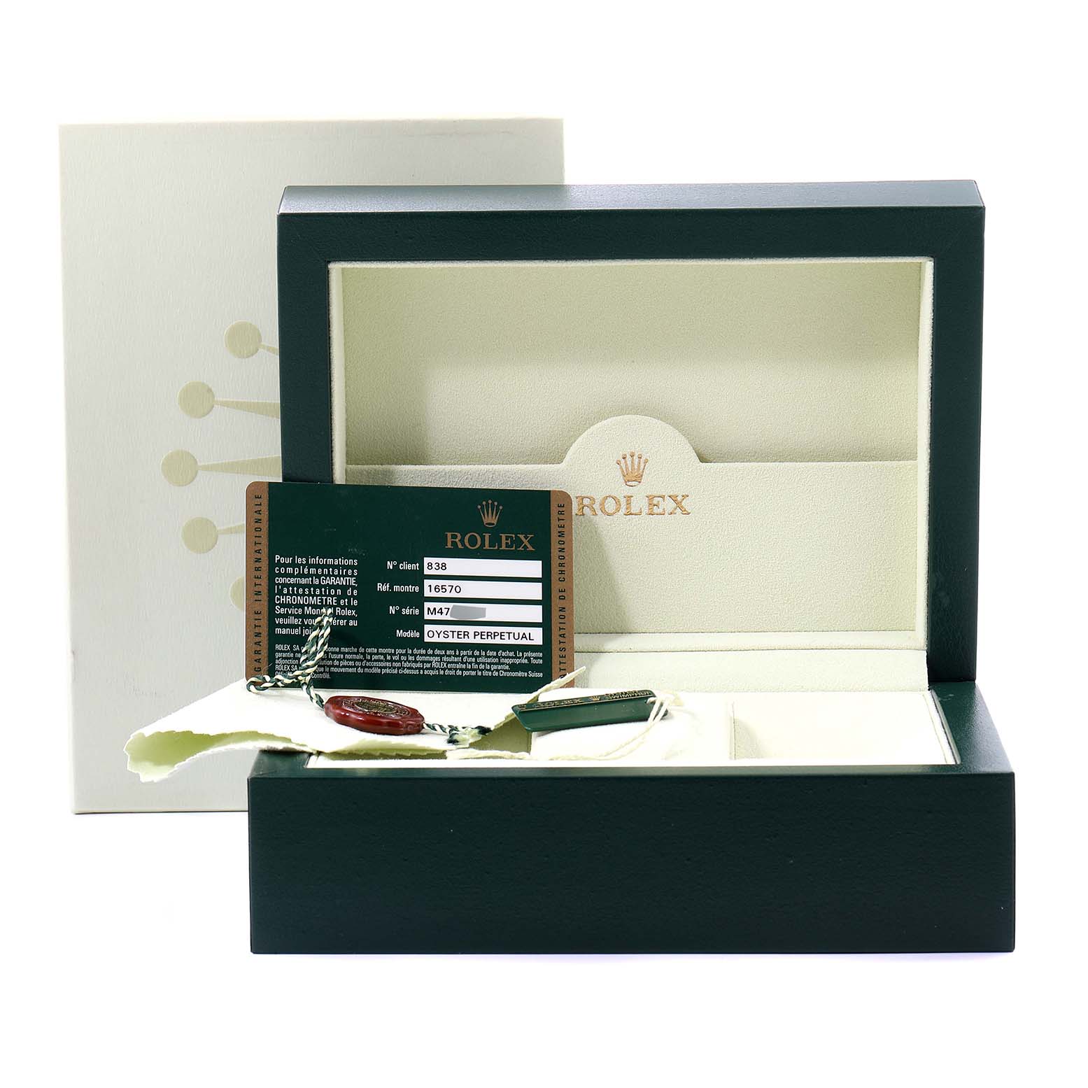 The image shows Rolex Explorer 16570 Men's Stainless Steel White Dial 16570 Men's Stainless Steel White Dial model watch accessories, including a box, a warranty card, and tags.