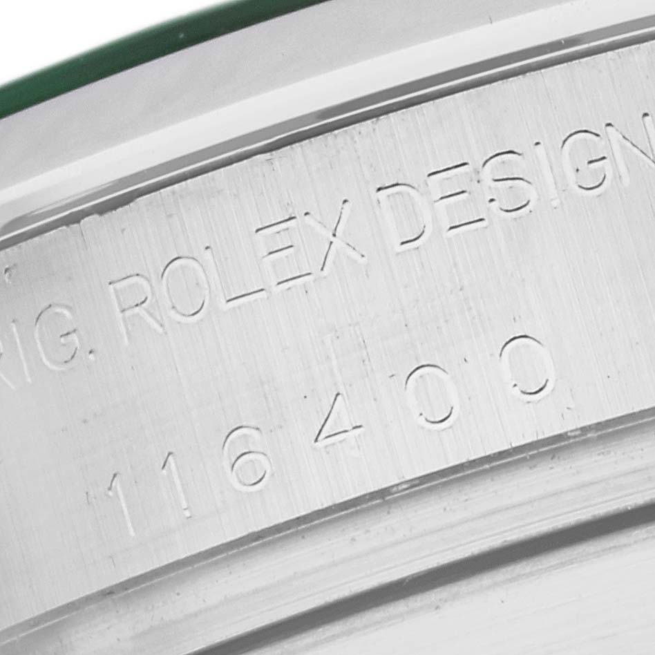 This image shows a close-up of the engraved flange of a Rolex Milgauss 116400GV Men's Stainless Steel Black Dial 116400GV Men's Stainless Steel Black Dial watch, highlighting the model number 116400.