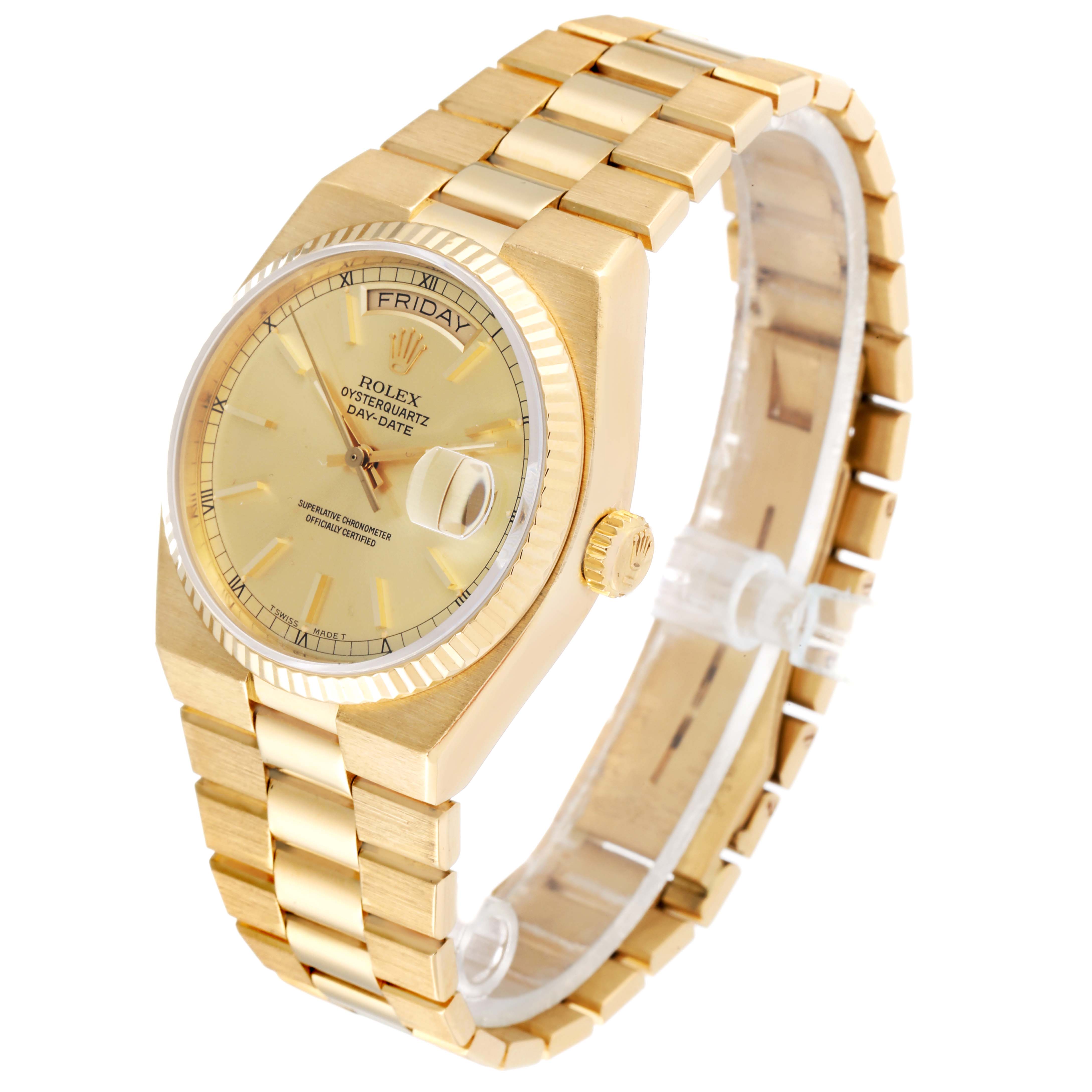 The Rolex Oysterquartz 19018 Men's Yellow Gold Champagne Dial 19018 Men's Yellow Gold Champagne Dial watch is shown at a three-quarter angle, highlighting its gold case, bracelet, dial, and day-date display.