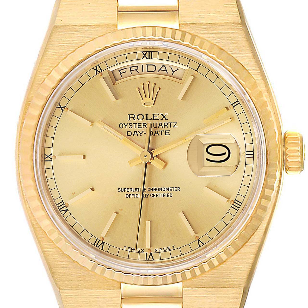 The image shows a front view of a gold Rolex Oysterquartz 19018 Men's Yellow Gold Champagne Dial 19018 Men's Yellow Gold Champagne Dial watch, highlighting its dial, date window, and fluted bezel.