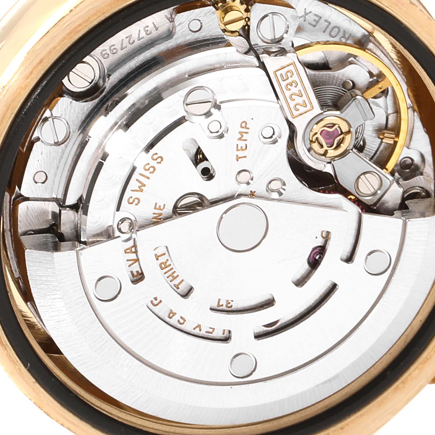 This image shows a close-up of the inner mechanical movement parts of a Rolex President 179238 Women
s Yellow Gold White Dial 179238 Women
s Yellow Gold White Dial model watch.
