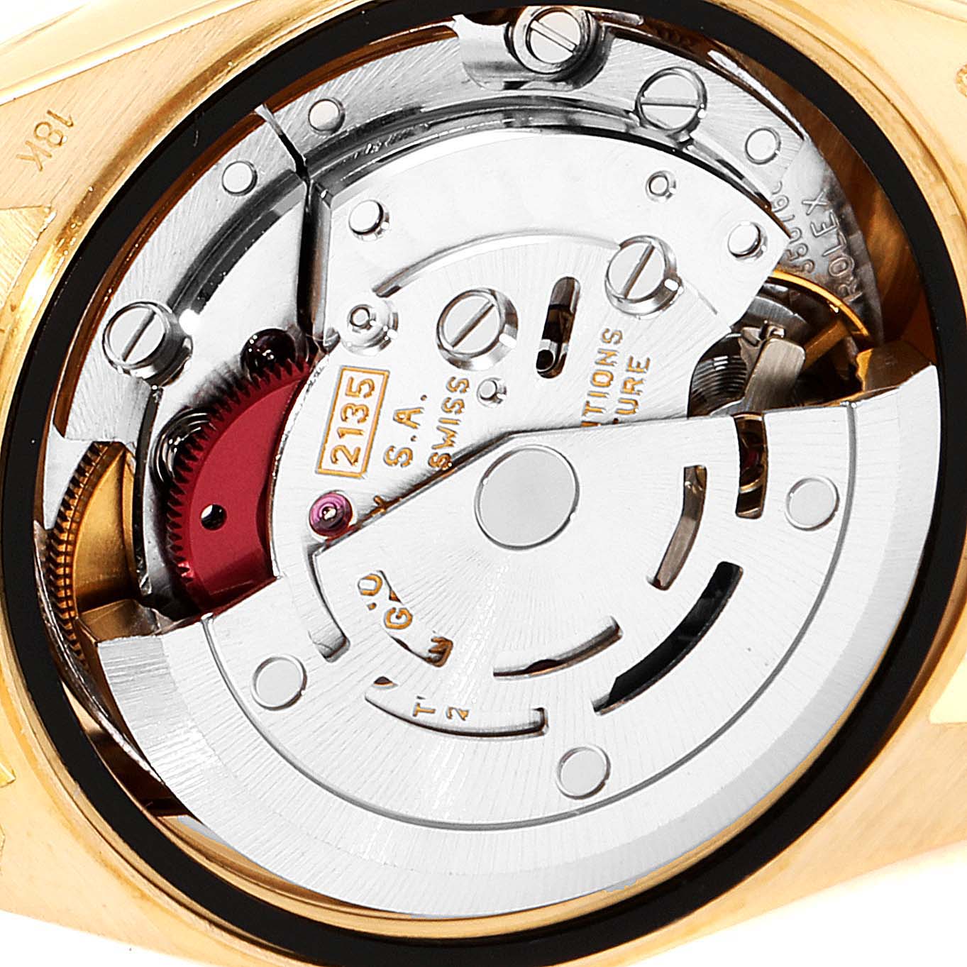 This image shows an up-close view of the movement inside a Rolex President 69168 Women
s Yellow Gold Champagne Dial 69168 Women
s Yellow Gold Champagne Dial model watch at an angled perspective.