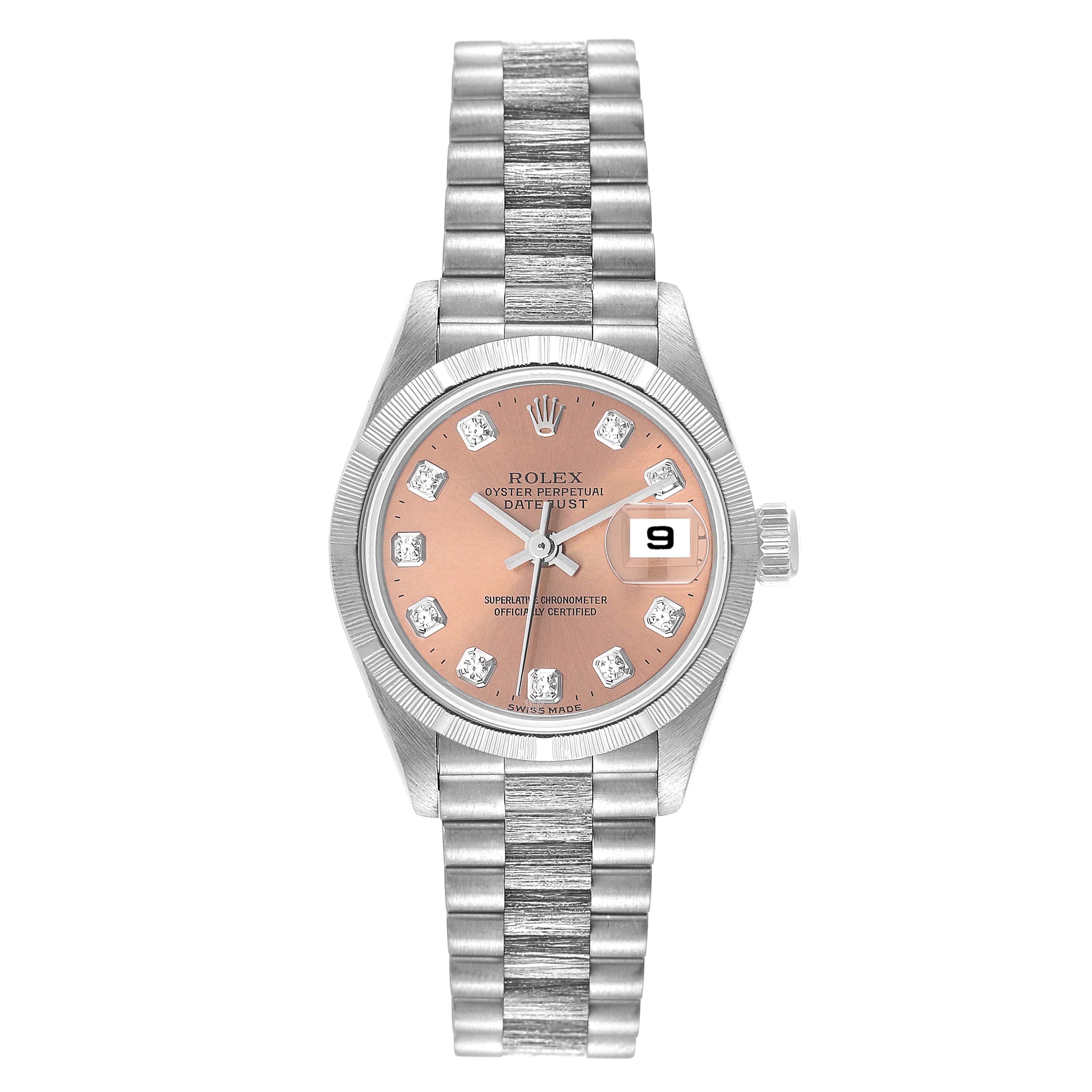 The image shows a front view of a Rolex President 79279 Women's White Gold Pink Dial 79279 Women's White Gold Pink Dial model watch, displaying its face, bezel, and bracelet.