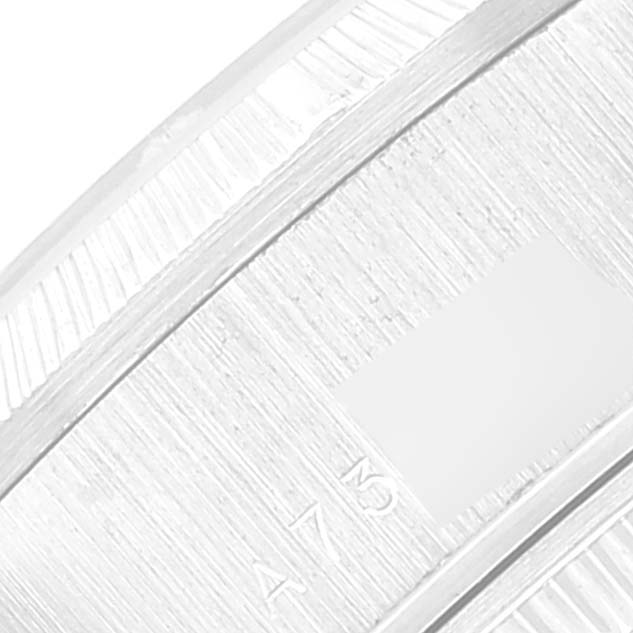 This close-up image of the Rolex President 79279 Women's White Gold Pink Dial 79279 Women's White Gold Pink Dial model shows part of the watch band and its fine detailing.