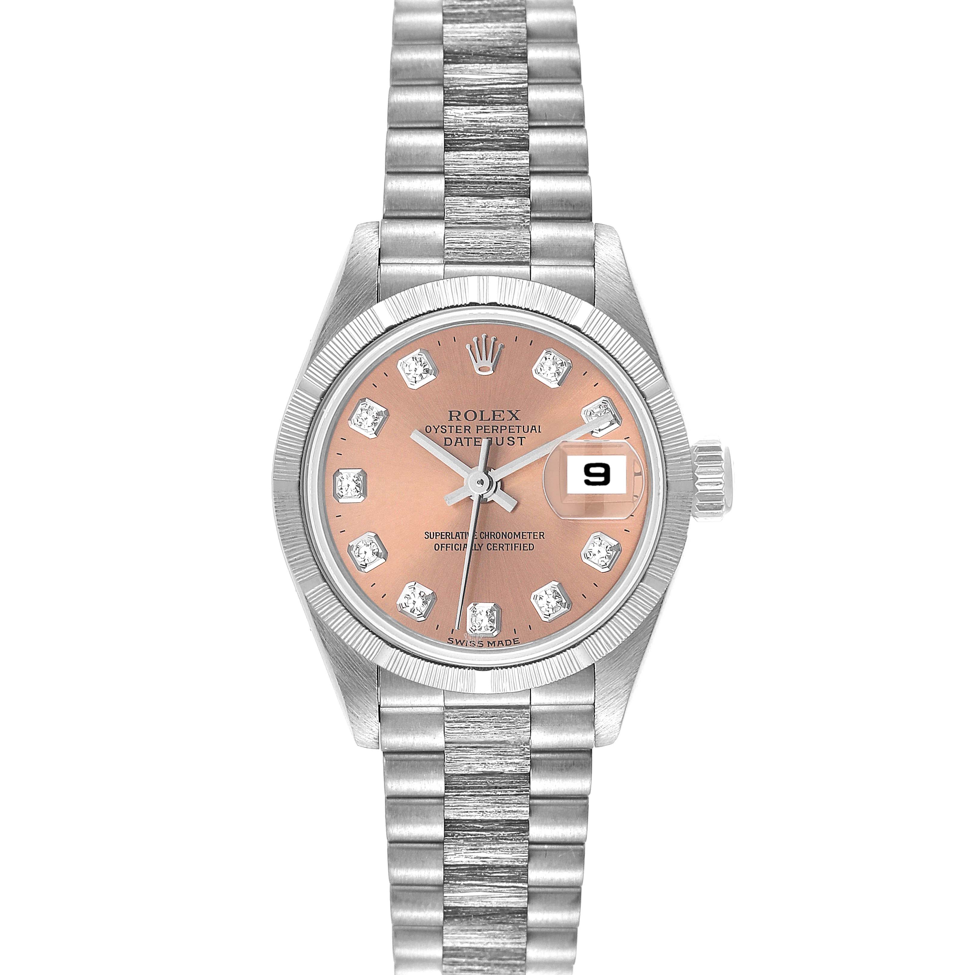The image shows a frontal view of a Rolex President 79279 Women's White Gold Pink Dial 79279 Women's White Gold Pink Dial watch, highlighting its face, bezel, and bracelet.