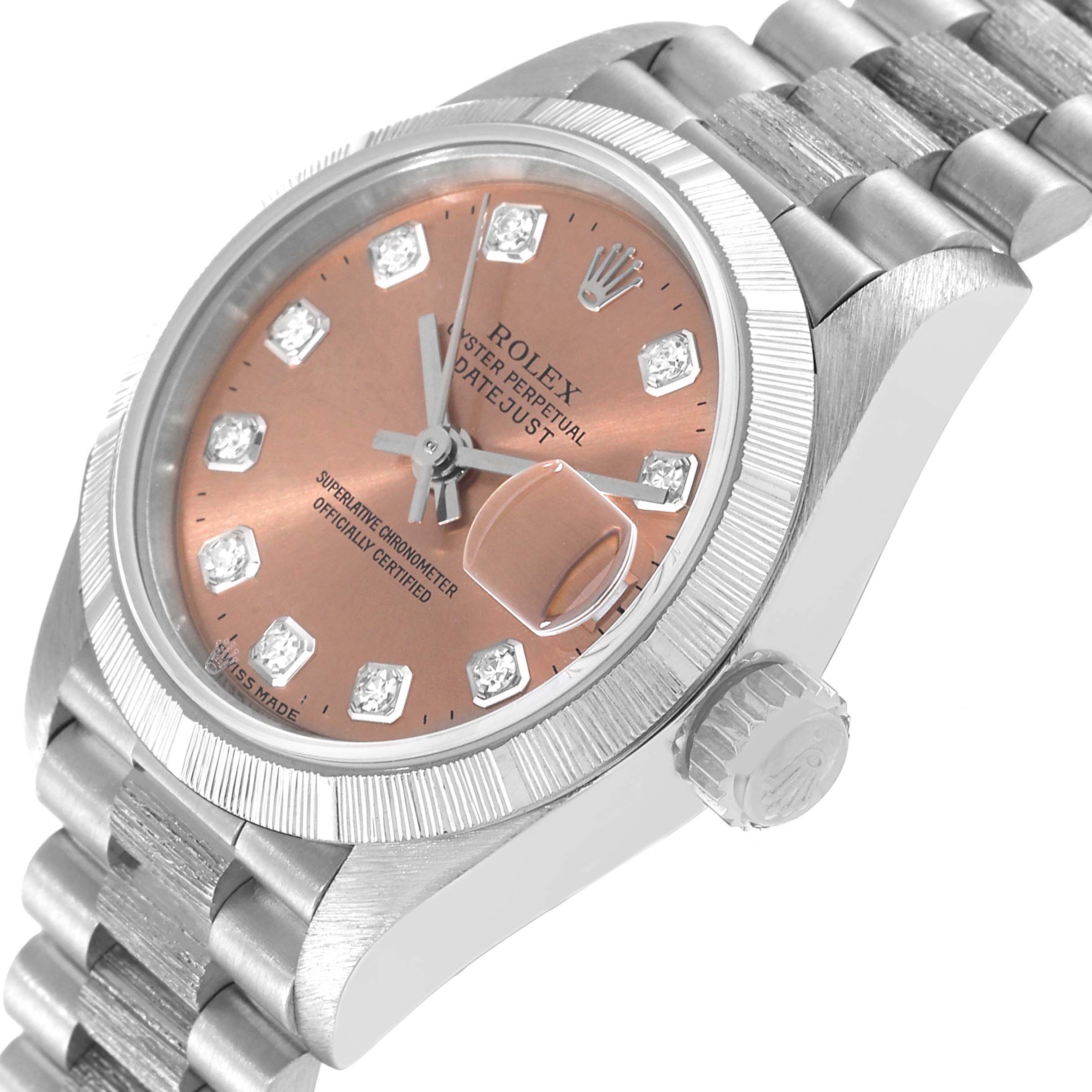 The image shows a close-up angle of the Rolex President 79279 Women's White Gold Pink Dial 79279 Women's White Gold Pink Dial model, highlighting the dial, bezel, and part of the bracelet.