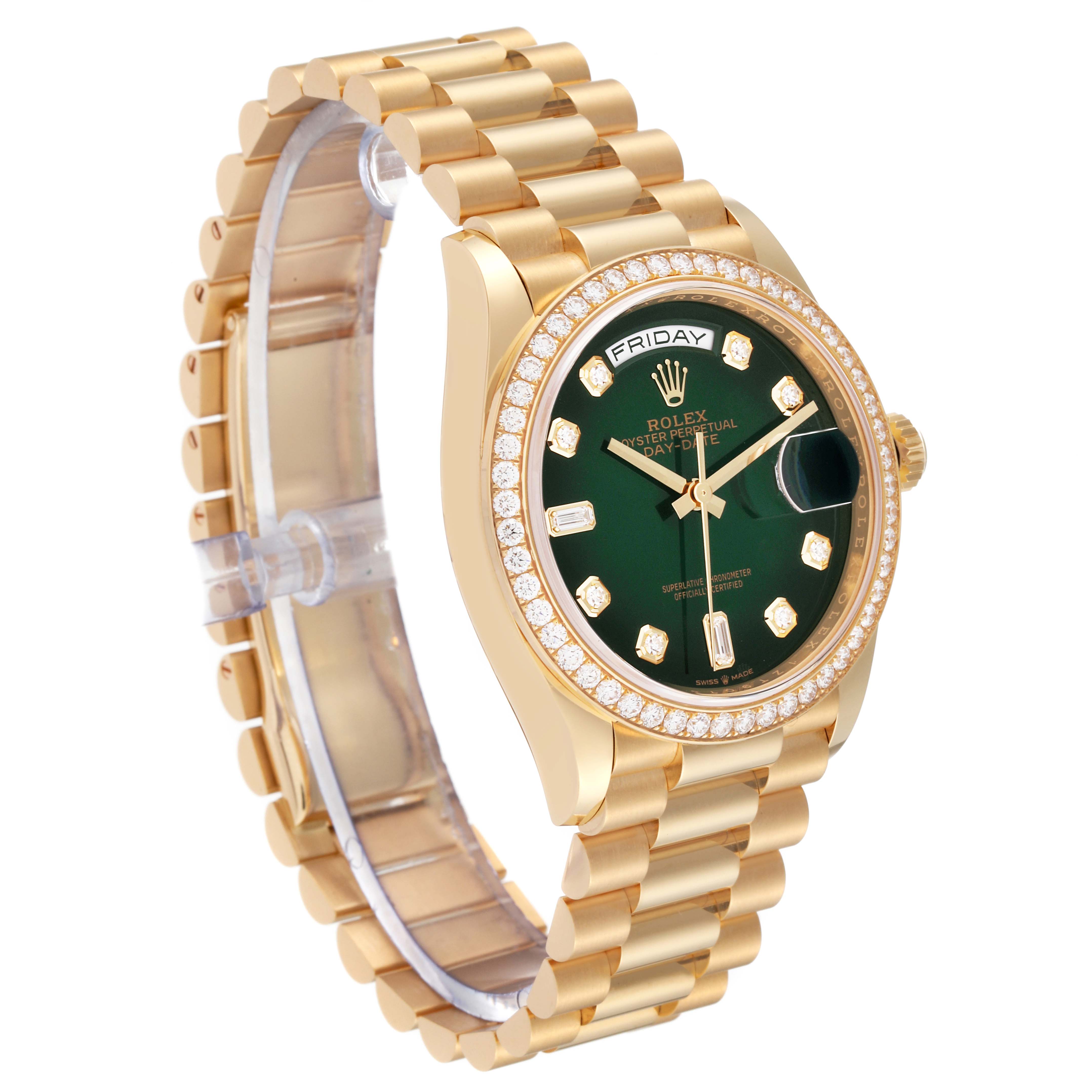 This image shows a Rolex President 128348RBR Men's Yellow Gold Green Dial 128348RBR Men's Yellow Gold Green Dial watch at an angle displaying its green dial, gold bracelet, diamond bezel, and day-date display.