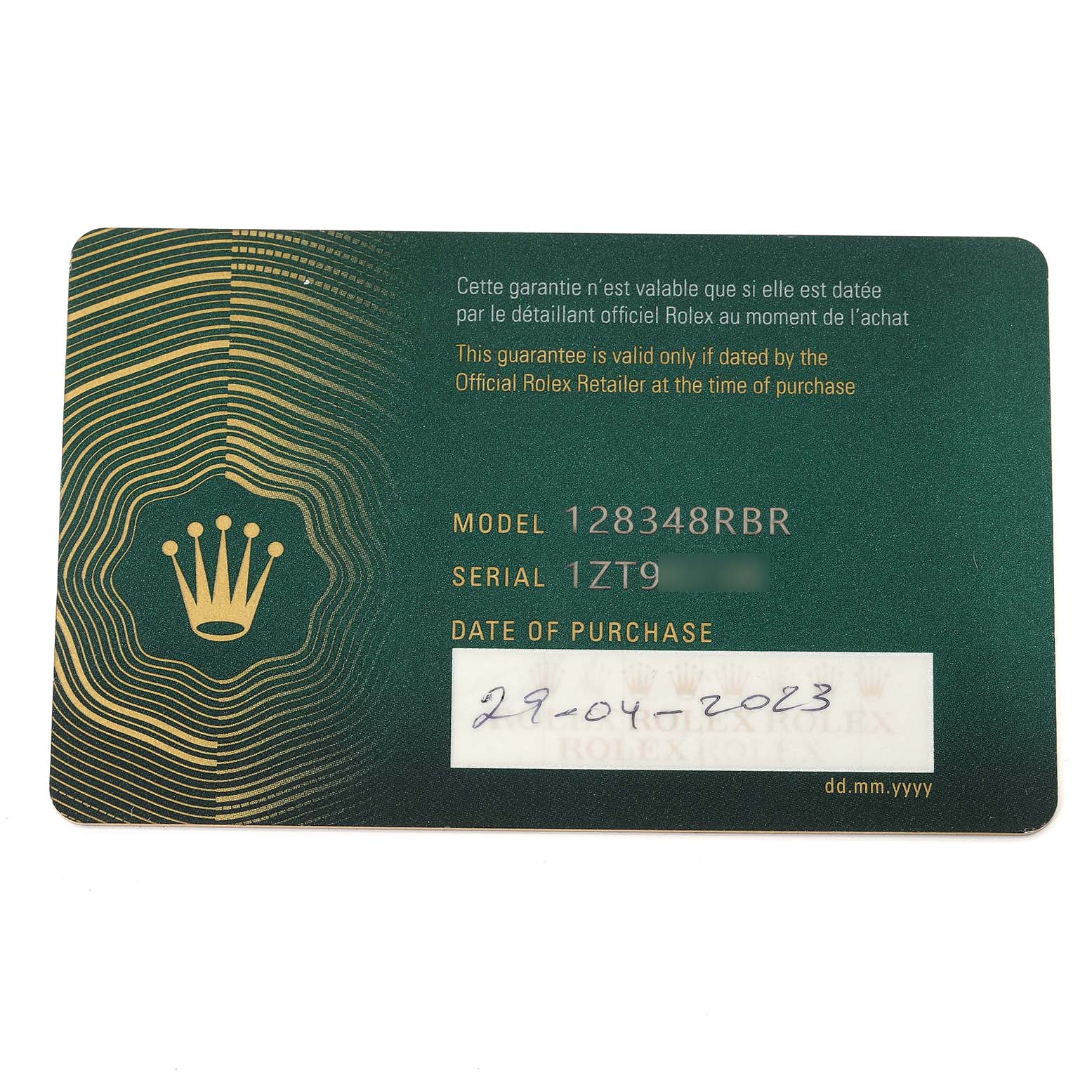 This image shows a warranty card for a Rolex President 128348RBR Men's Yellow Gold Green Dial 128348RBR Men's Yellow Gold Green Dial model watch, displaying model, serial number, and date of purchase.