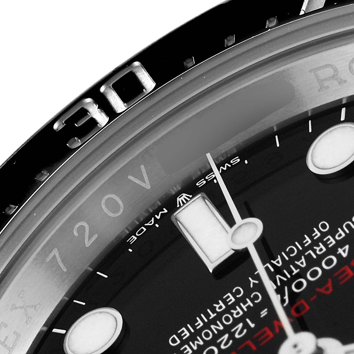 The image shows a close-up of the Rolex Sea-Dweller 126600 Men
s Stainless Steel Black Dial 126600 Men
s Stainless Steel Black Dial
s dial, specifically near the 30-minute mark and part of the text on the watch face.