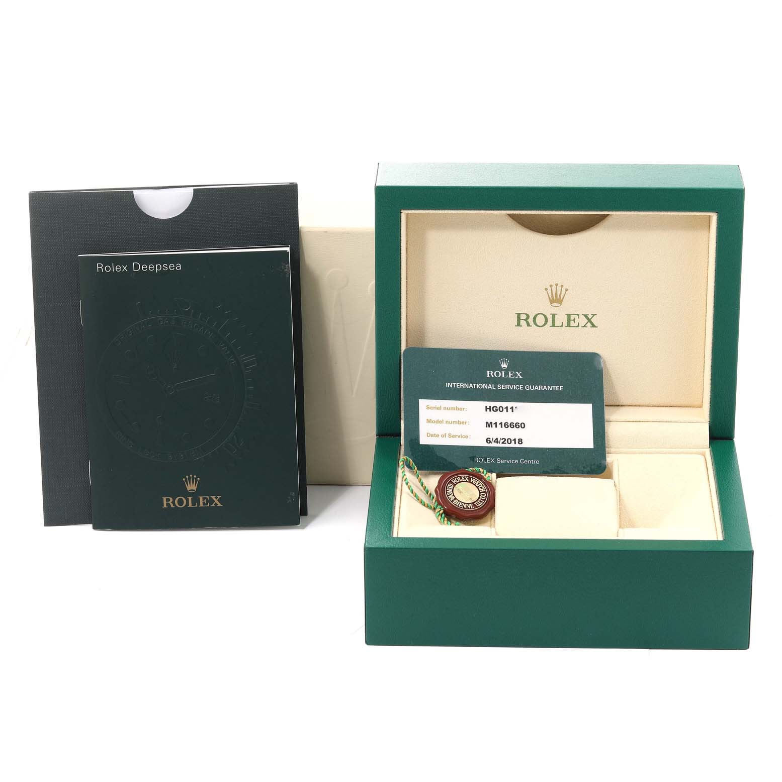 The image shows a Rolex Sea-Dweller 116660 Men
s Stainless Steel Black Dial 116660 Men
s Stainless Steel Black Dial watch box, guarantee card, booklet, and a hang tag, viewed from the front.