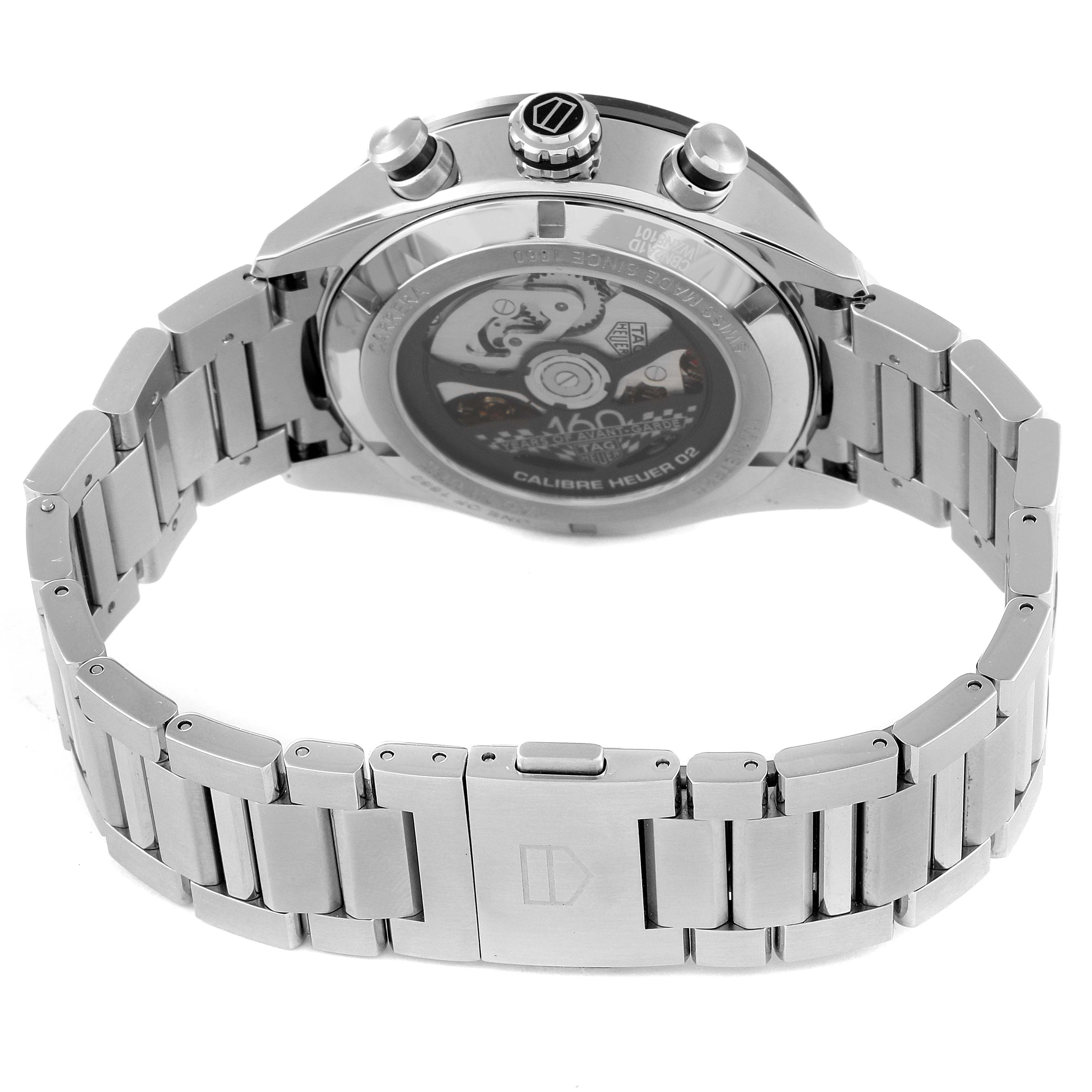 The image shows the back view of a Tag Heuer Carrera CBN2A1D.BA0643 Men's Stainless Steel Silver Dial CBN2A1D.BA0643 Men's Stainless Steel Silver Dial watch, highlighting its transparent case back and stainless steel bracelet.