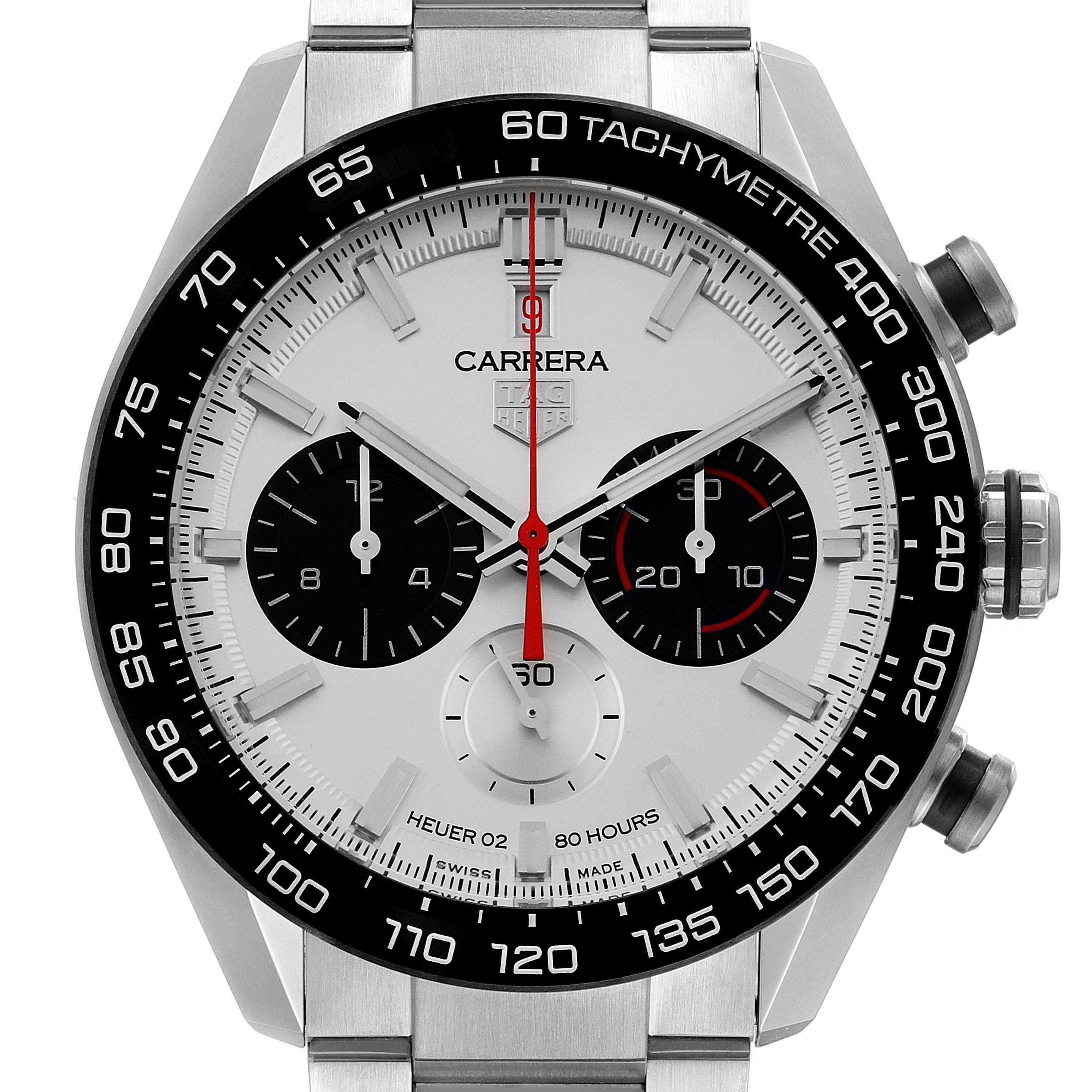 The image shows a front view of the Carrera model by Tag Heuer, highlighting the dial, tachymeter, subdials, and chronograph features.