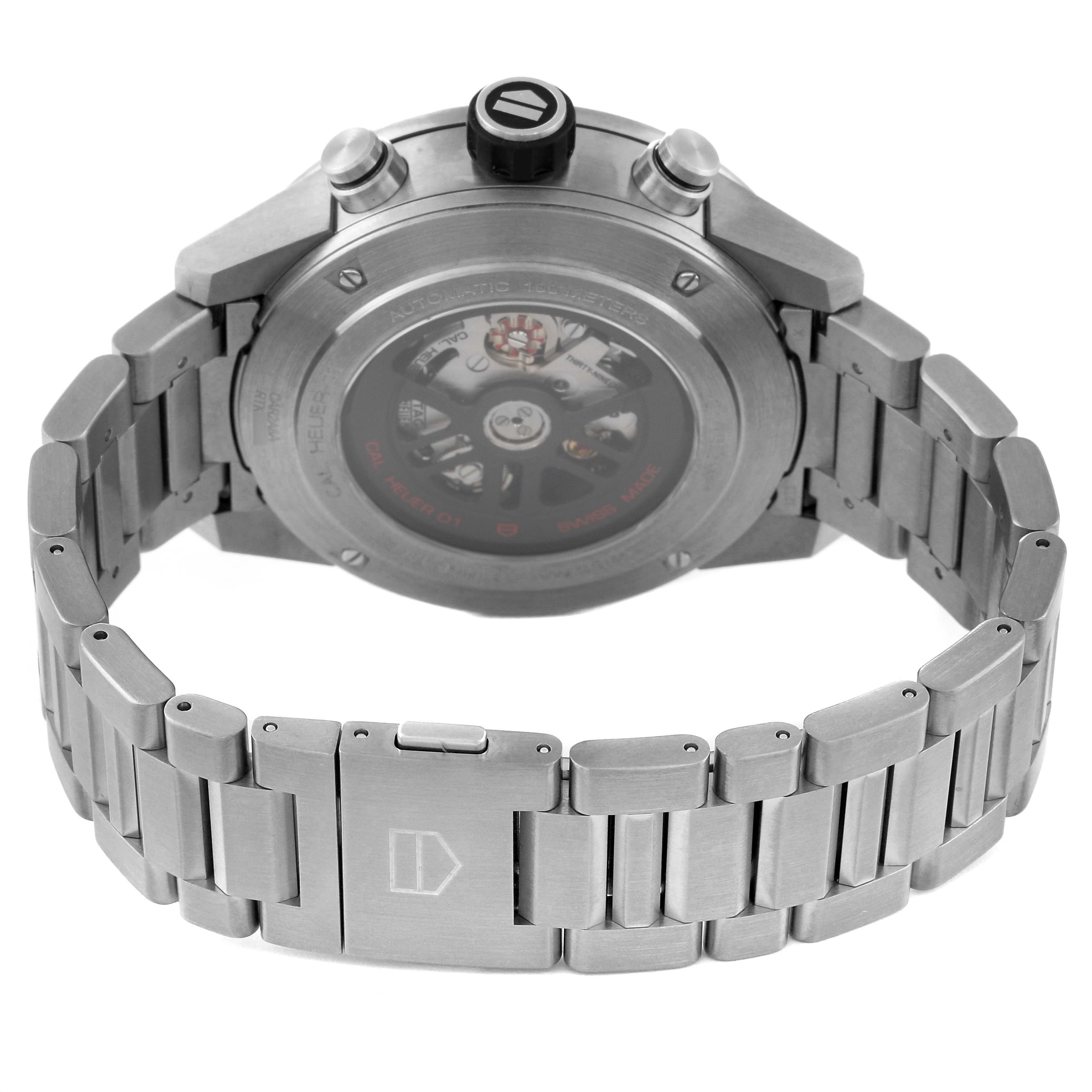 The image shows the back view of a Tag Heuer Carrera CAR2A8A.BF0707 Men's Titanium Grey Dial CAR2A8A.BF0707 Men's Titanium Grey Dial watch, highlighting the clasp, caseback, and part of the stainless steel bracelet.