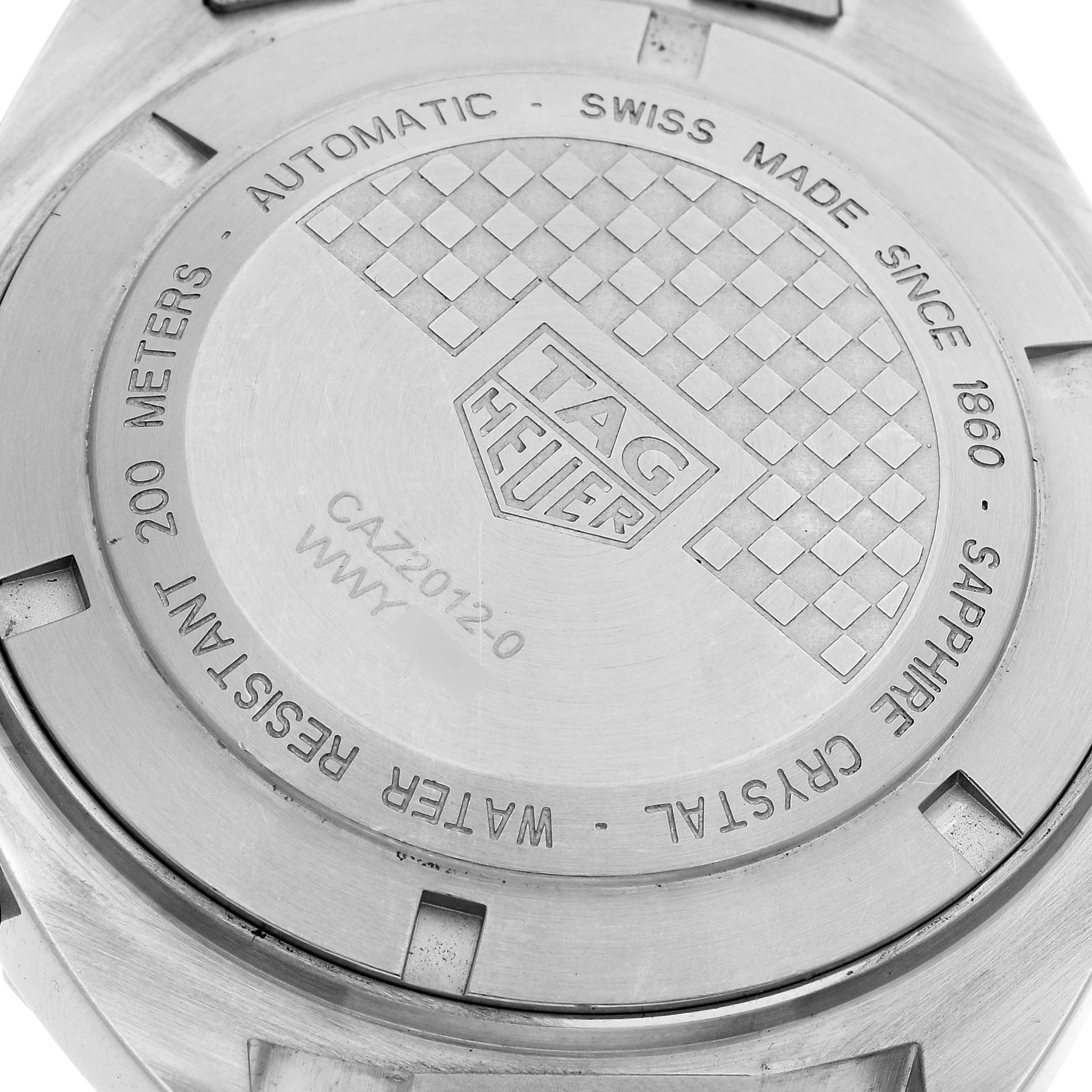 This image shows the back case of a Tag Heuer Formula 1 CAZ2012-0 Men's Stainless Steel Grey Dial CAZ2012-0 Men's Stainless Steel Grey Dial watch, highlighting the engraved logo and specifications.