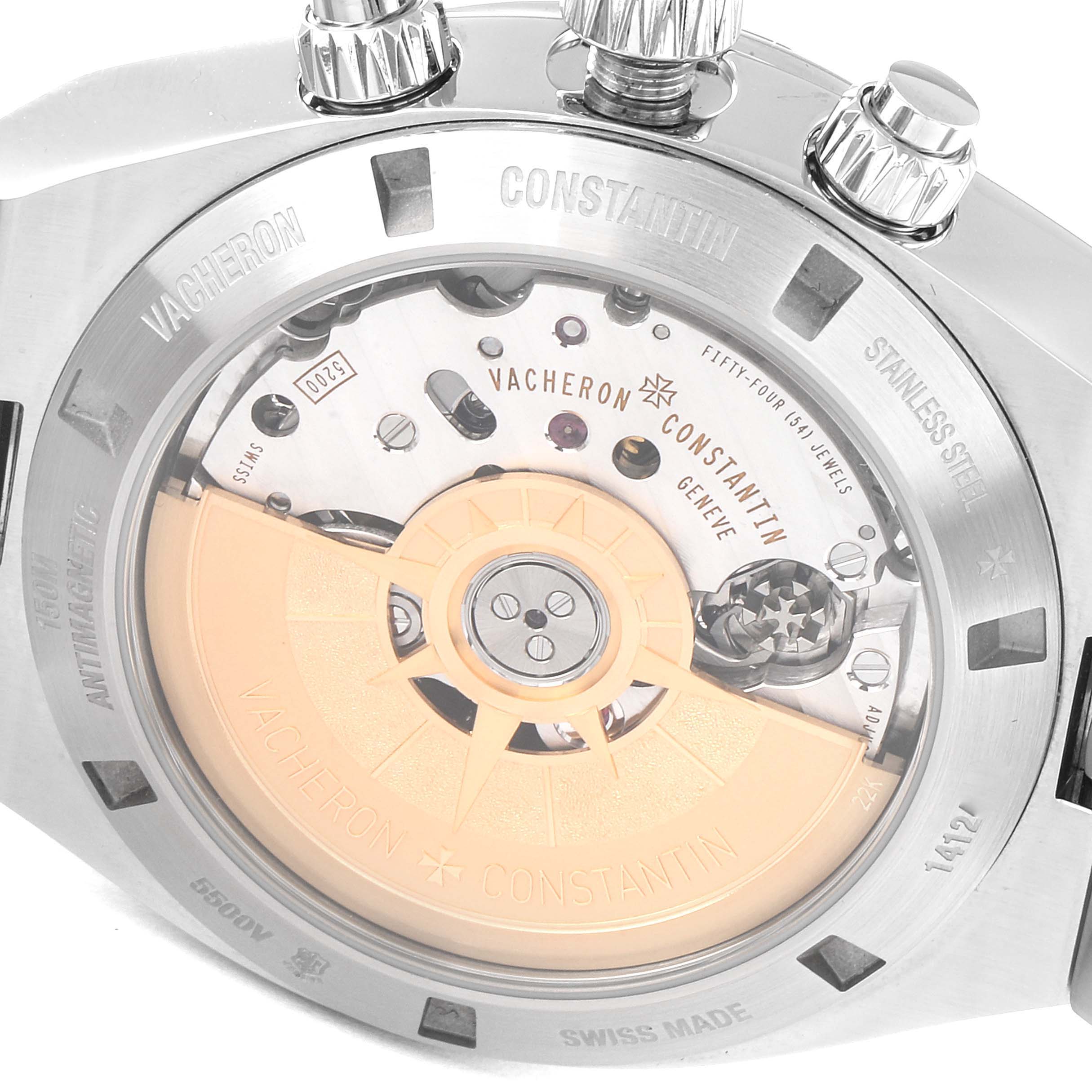 This image shows the back view of a Vacheron Constantin Overseas 5500V/110A-B148 Men's Stainless Steel Blue Dial 5500V/110A-B148 Men's Stainless Steel Blue Dial model, highlighting its intricate automatic movement and engravings.