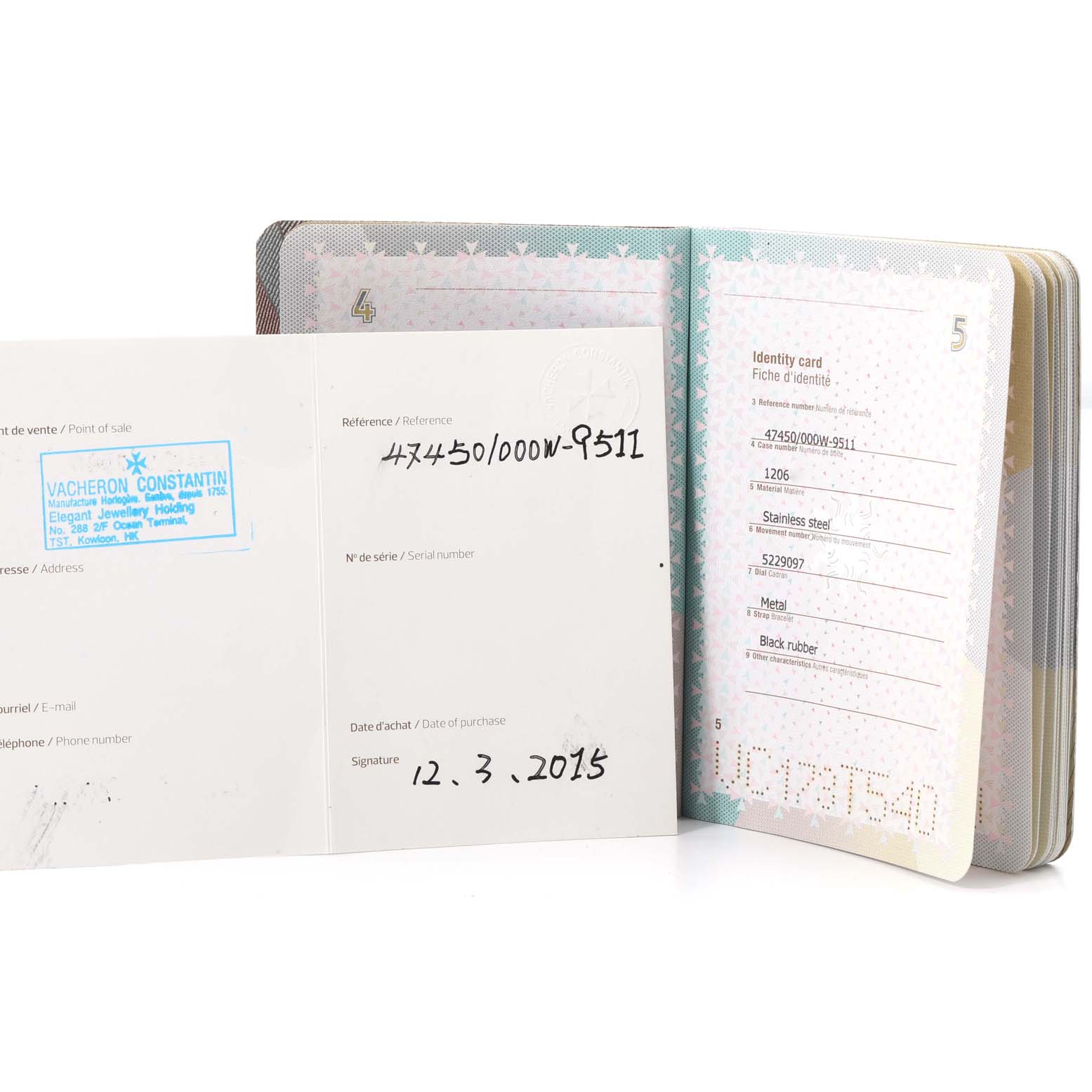 The image shows the papers and warranty card for the Vacheron Constantin Overseas 47450/000W-9511 Men's Stainless Steel Black Dial 47450/000W-9511 Men's Stainless Steel Black Dial model, captured from a top angle.