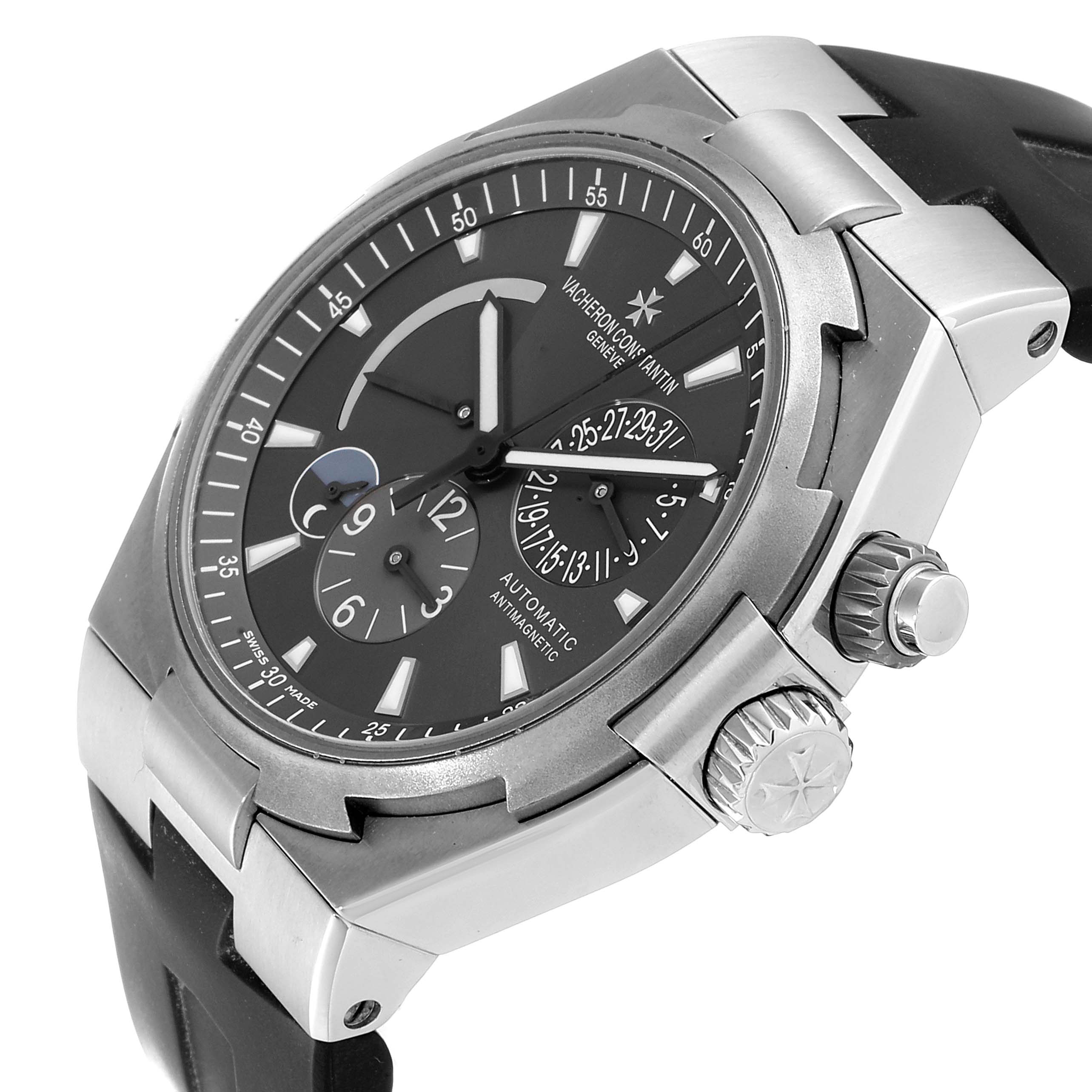 The image shows a Vacheron Constantin Overseas 47450/000W-9511 Men's Stainless Steel Black Dial 47450/000W-9511 Men's Stainless Steel Black Dial model watch viewed from an angled side perspective, highlighting the dial and crown.