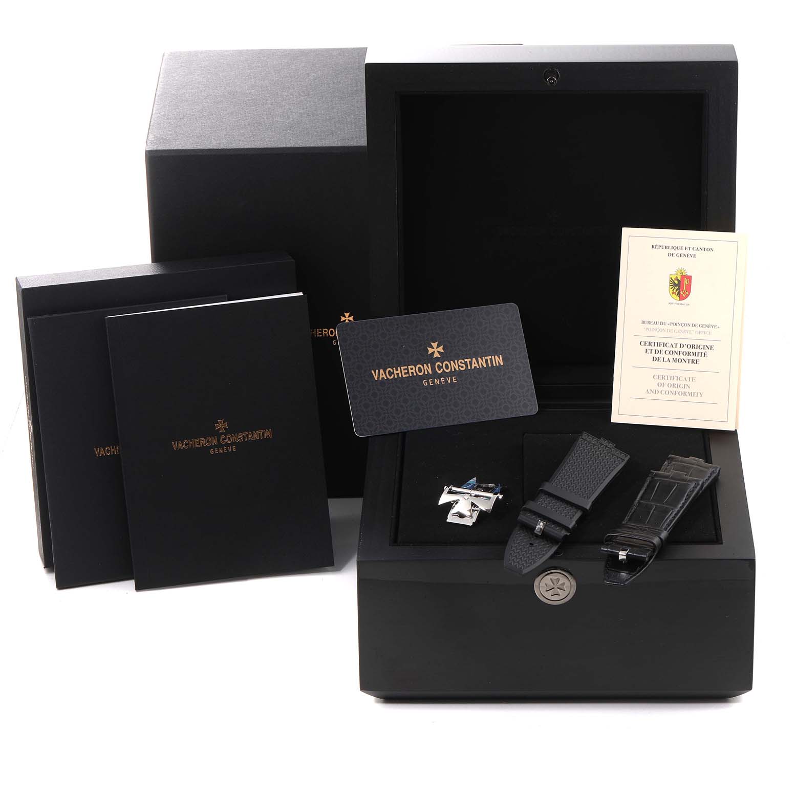 This image shows the Vacheron Constantin Overseas 7900V/110A Men
s Stainless Steel Black Dial 7900V/110A Men
s Stainless Steel Black Dial model watch set, including the box, additional straps, warranty card, and documentation.