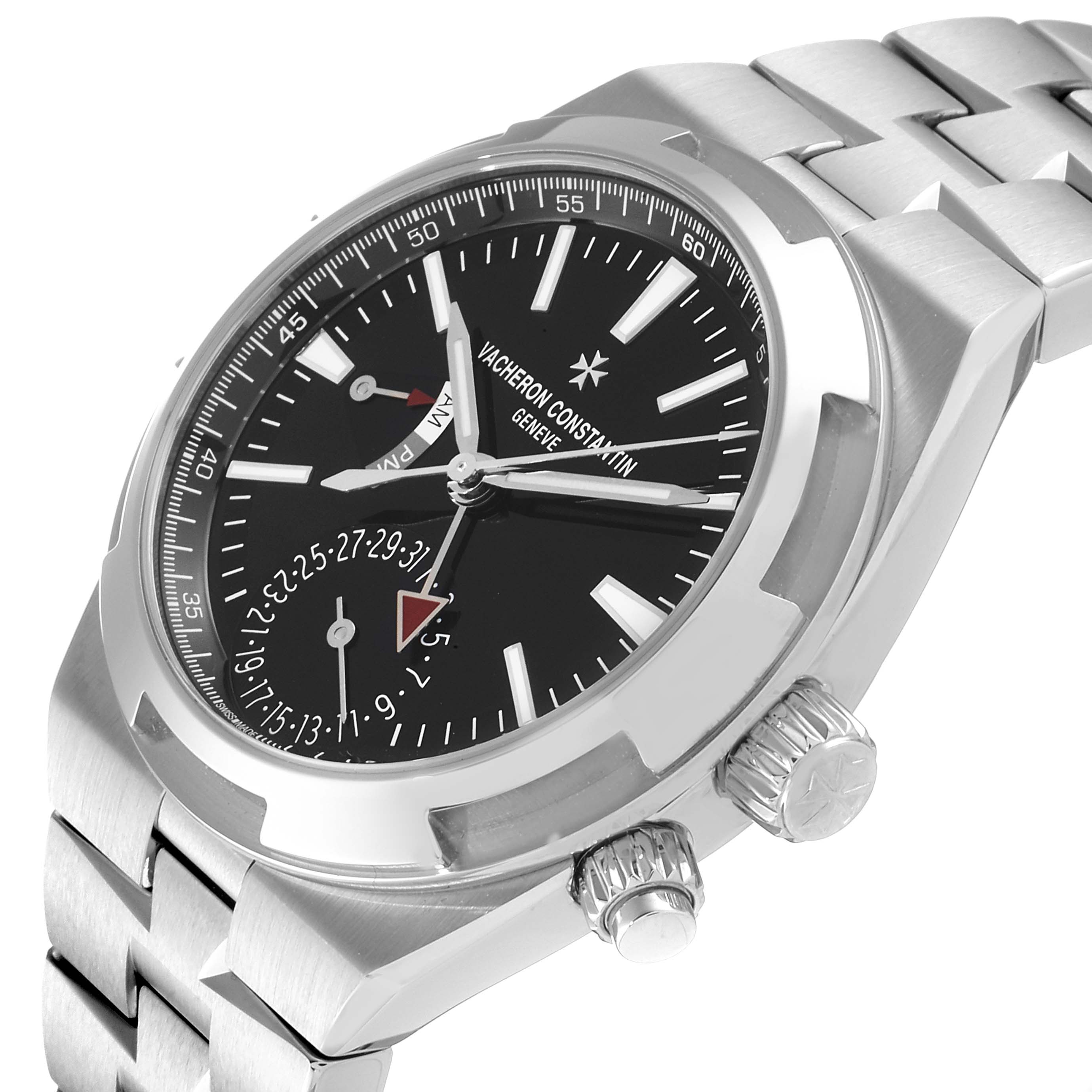 The image shows a Vacheron Constantin Overseas 7900V/110A Men
s Stainless Steel Black Dial 7900V/110A Men
s Stainless Steel Black Dial watch from a three-quarter angle, highlighting the dial, bracelet, and dual crowns.