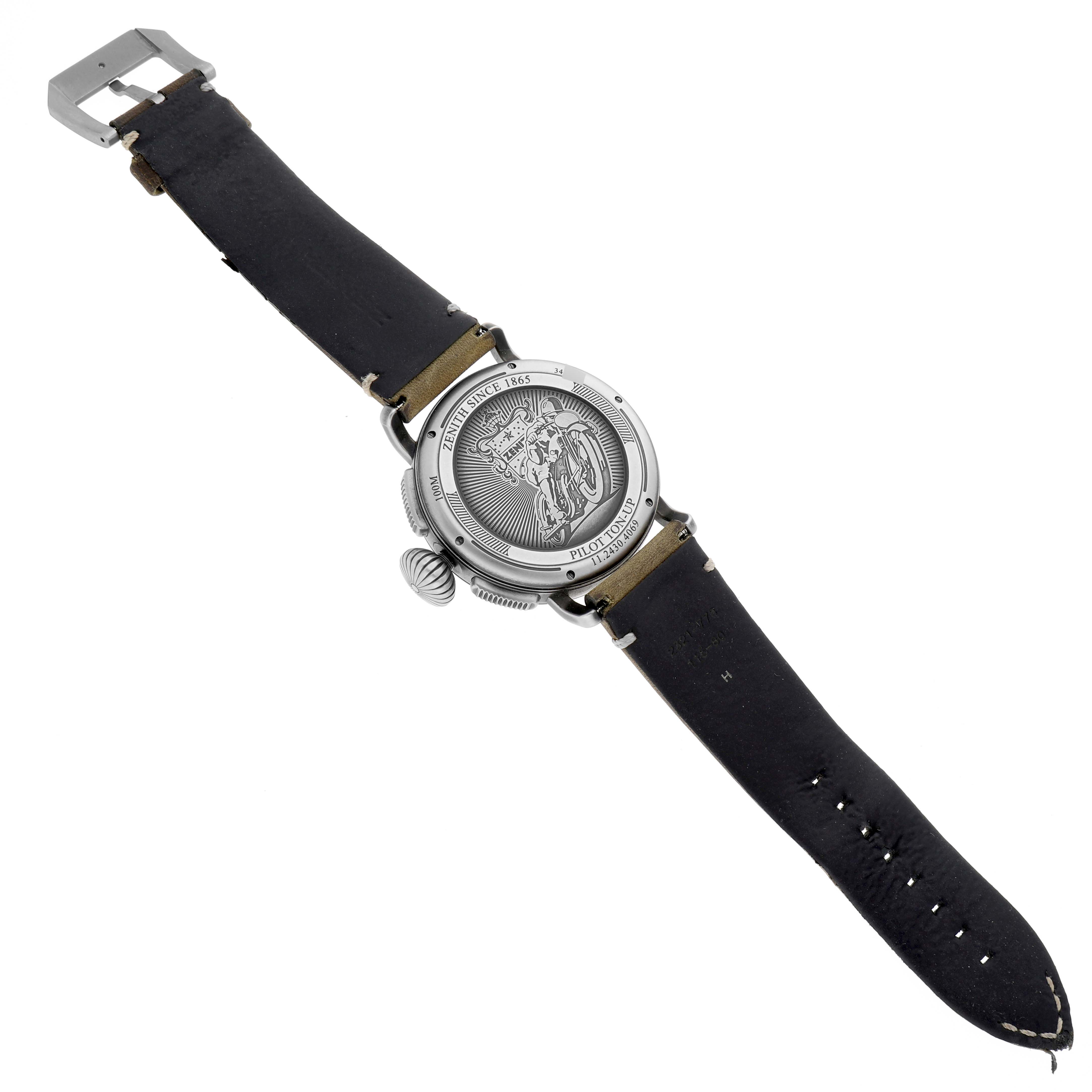 The image shows the back and strap of a Zenith Pilot 11.2430.4069 Men's Stainless Steel Grey Dial 11.2430.4069 Men's Stainless Steel Grey Dial model watch, revealing its engraved case back.