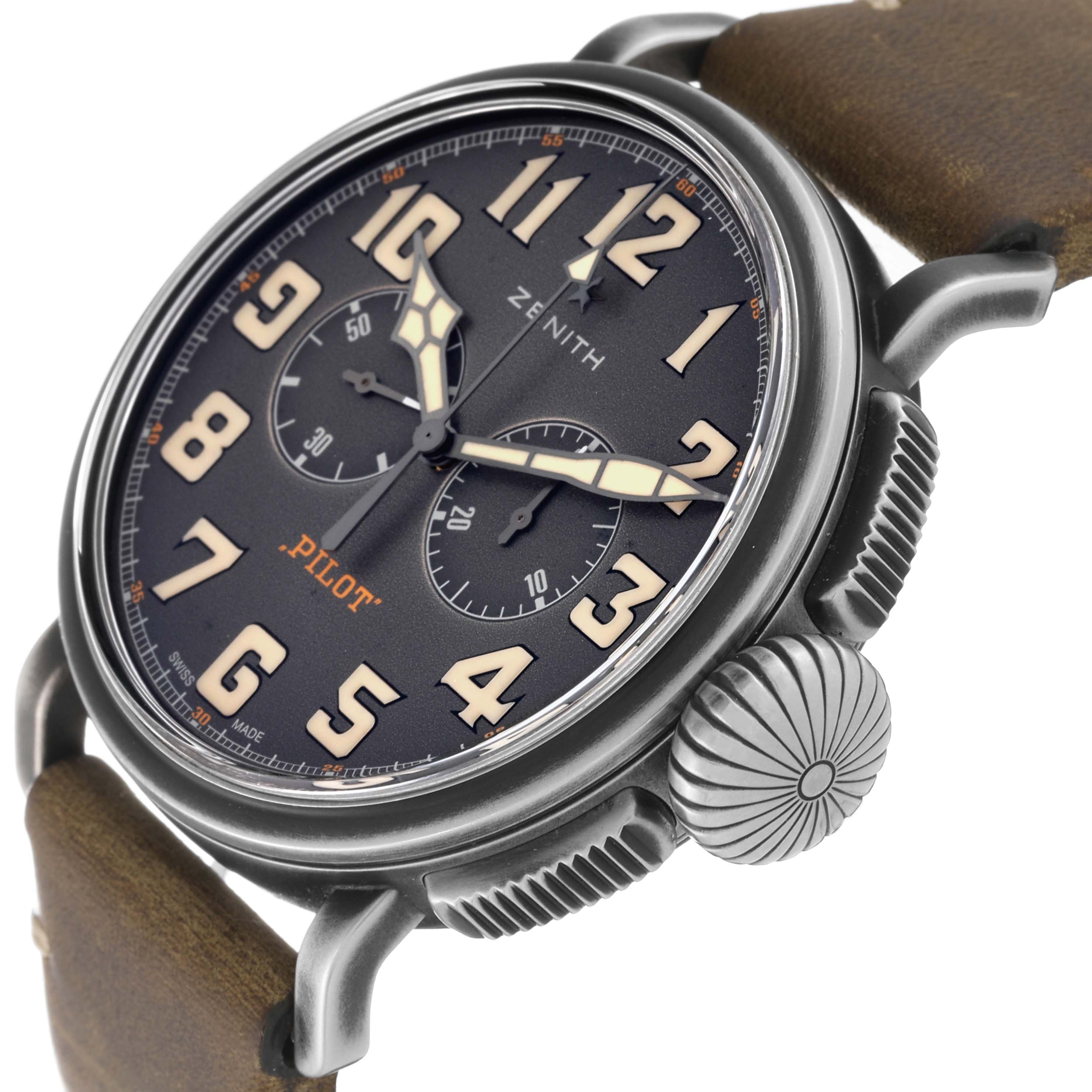The Zenith Pilot 11.2430.4069 Men's Stainless Steel Grey Dial 11.2430.4069 Men's Stainless Steel Grey Dial model watch is shown at a close-up angle, highlighting the dial, hands, crown, and part of the leather strap.