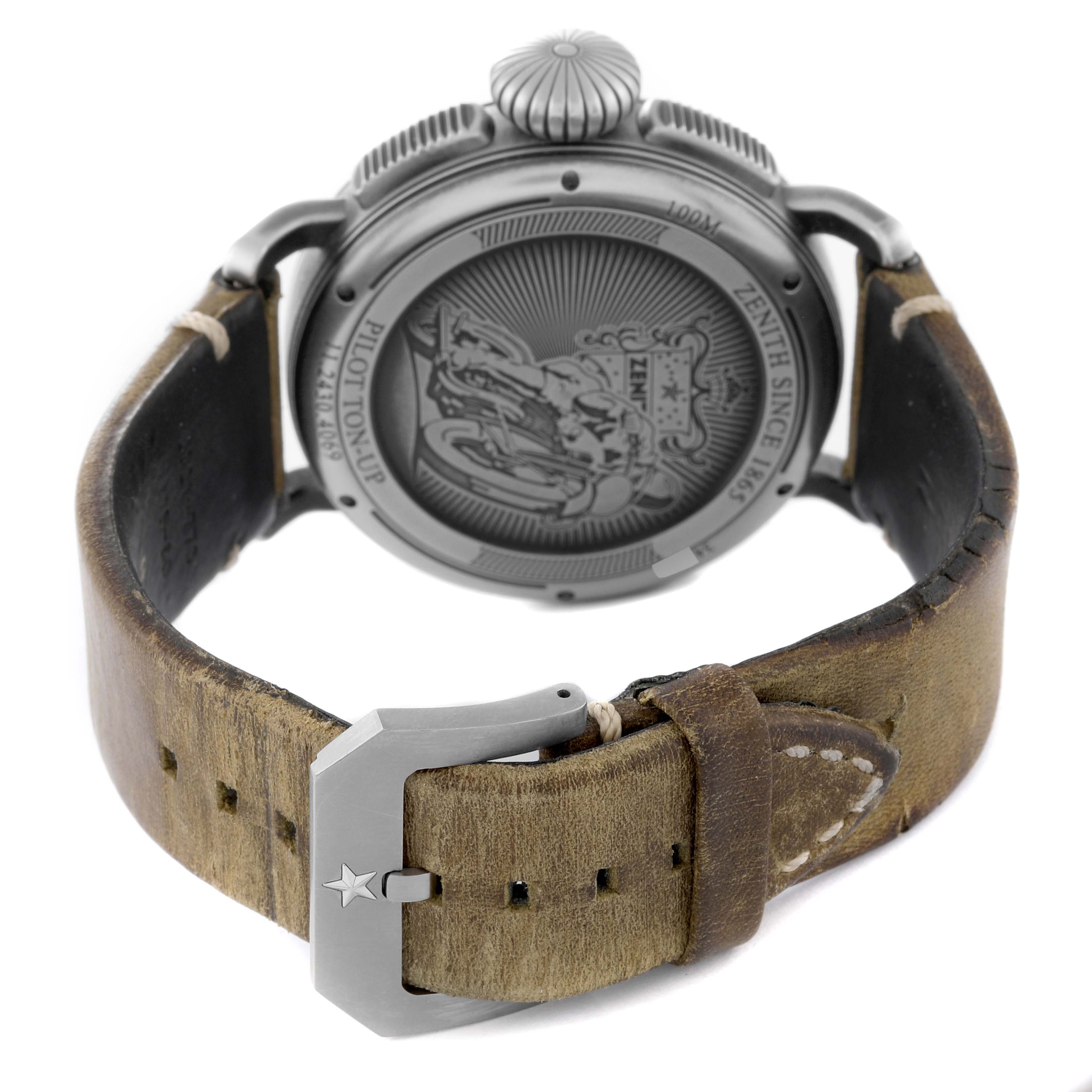 The image shows the back and leather strap of a Pilot model watch by Zenith, revealing the case back and buckle.