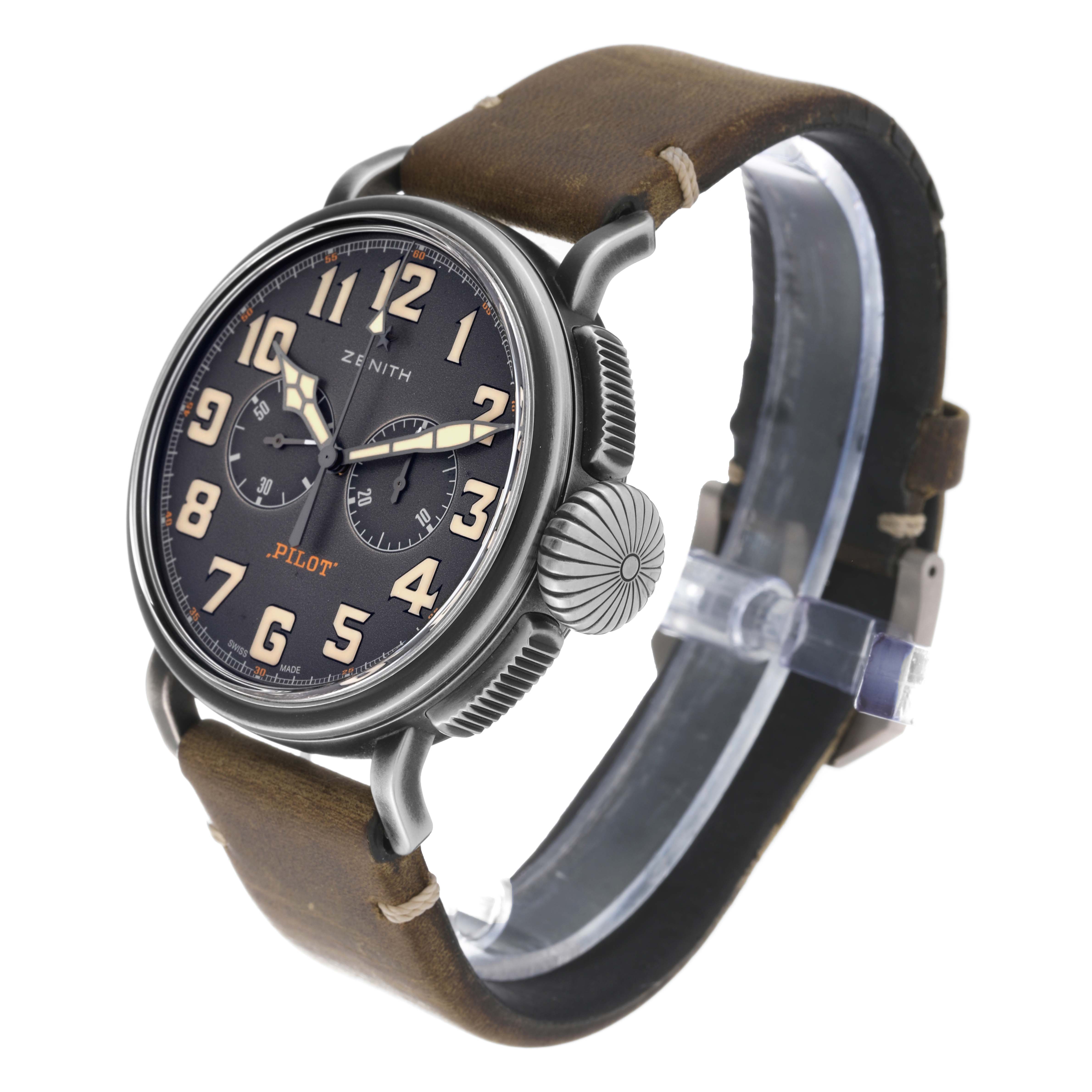 This Zenith Pilot 11.2430.4069 Men's Stainless Steel Grey Dial 11.2430.4069 Men's Stainless Steel Grey Dial model watch is shown at a three-quarter angle, displaying the face, crown, and leather strap.