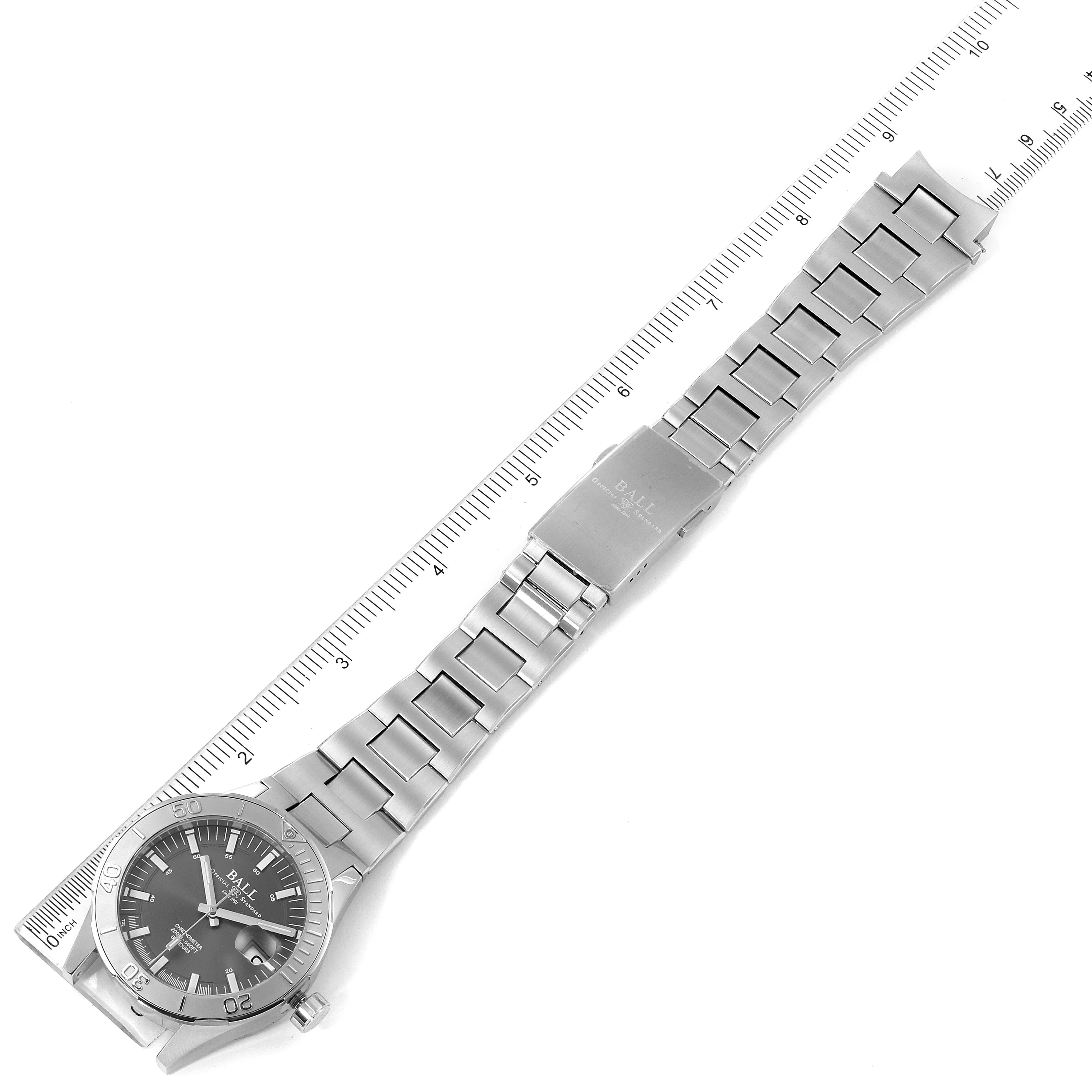 The image shows a Roadmaster watch by Ball, including its stainless steel strap and clasp, along with a graduated ruler for scale.