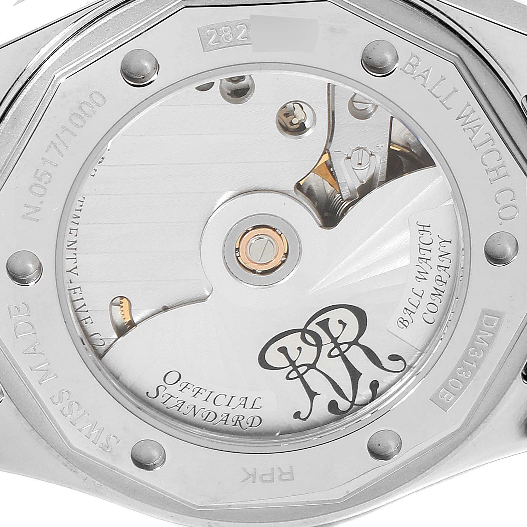 The image shows the back of the Ball Roadmaster DM3130B-S3CJ-GY Men's Stainless Steel Grey Dial DM3130B-S3CJ-GY Men's Stainless Steel Grey Dial watch, highlighting its internal mechanisms and engravings.