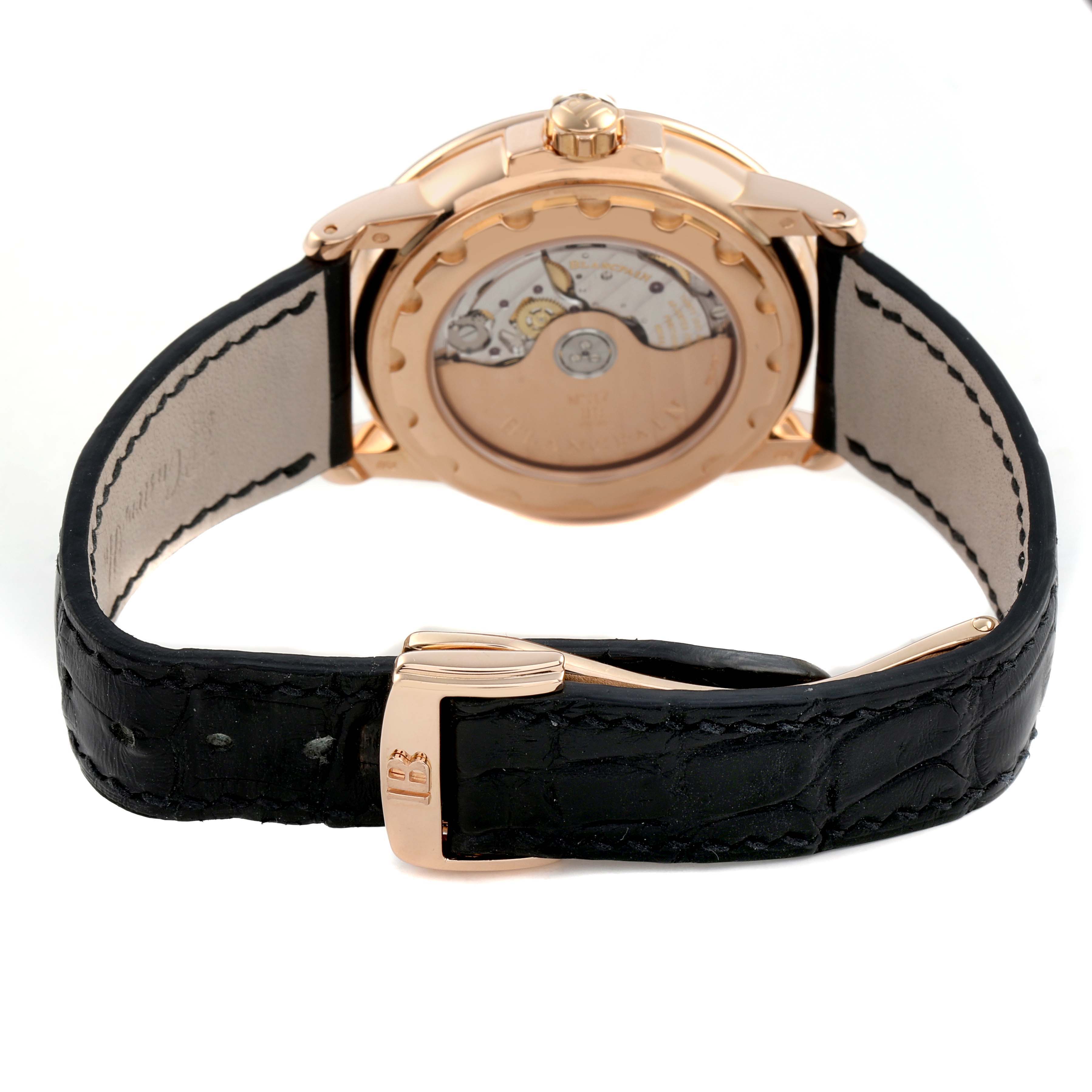 The image shows the back view of the Blancpain Villeret 2160-3630-53B Men's Rose Gold Black Dial model, displaying the watch's open caseback and leather strap buckle.