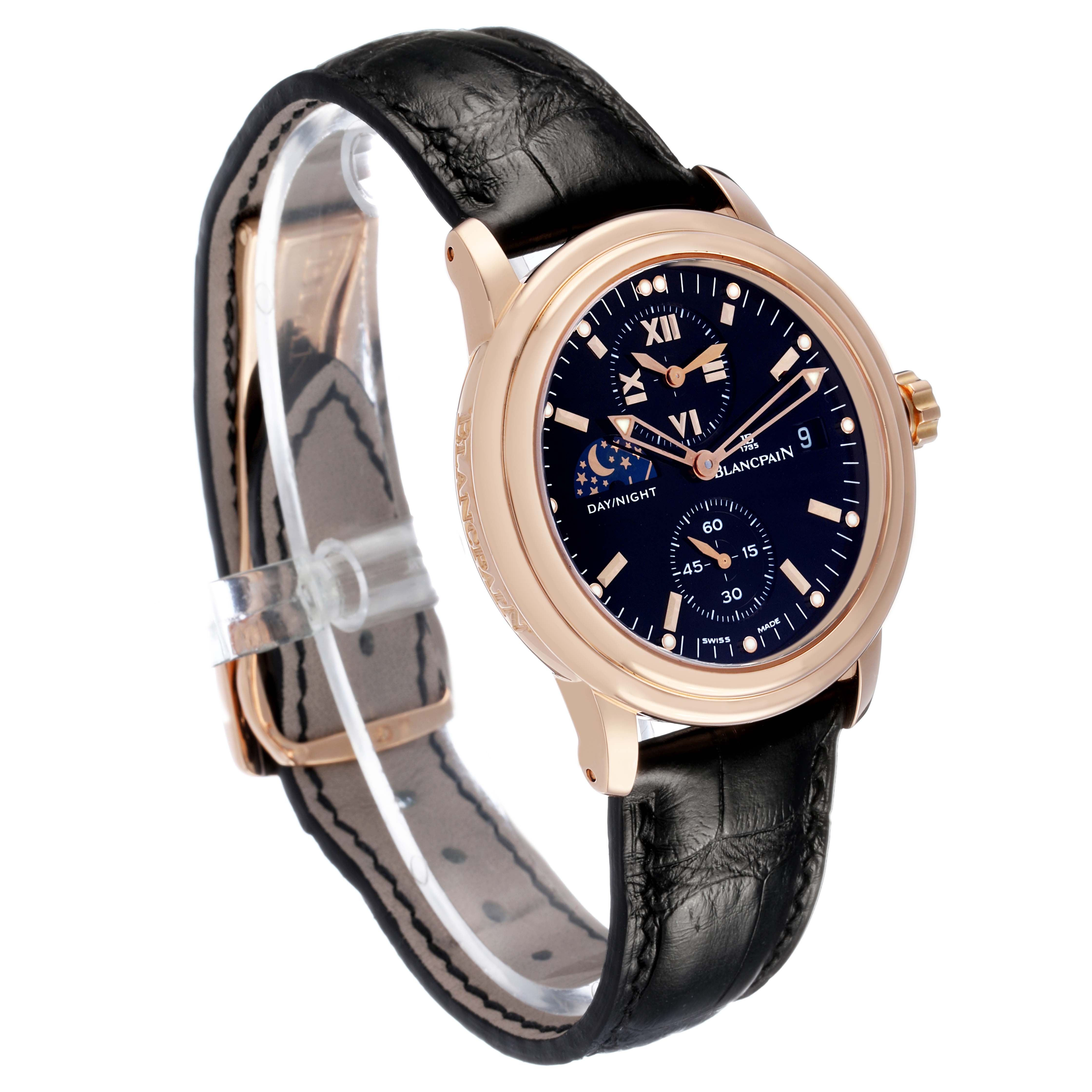 The watch is angled to show the face and side of the Blancpain Villeret 2160-3630-53B Men's Rose Gold Black Dial, highlighting the dial, strap, and case.