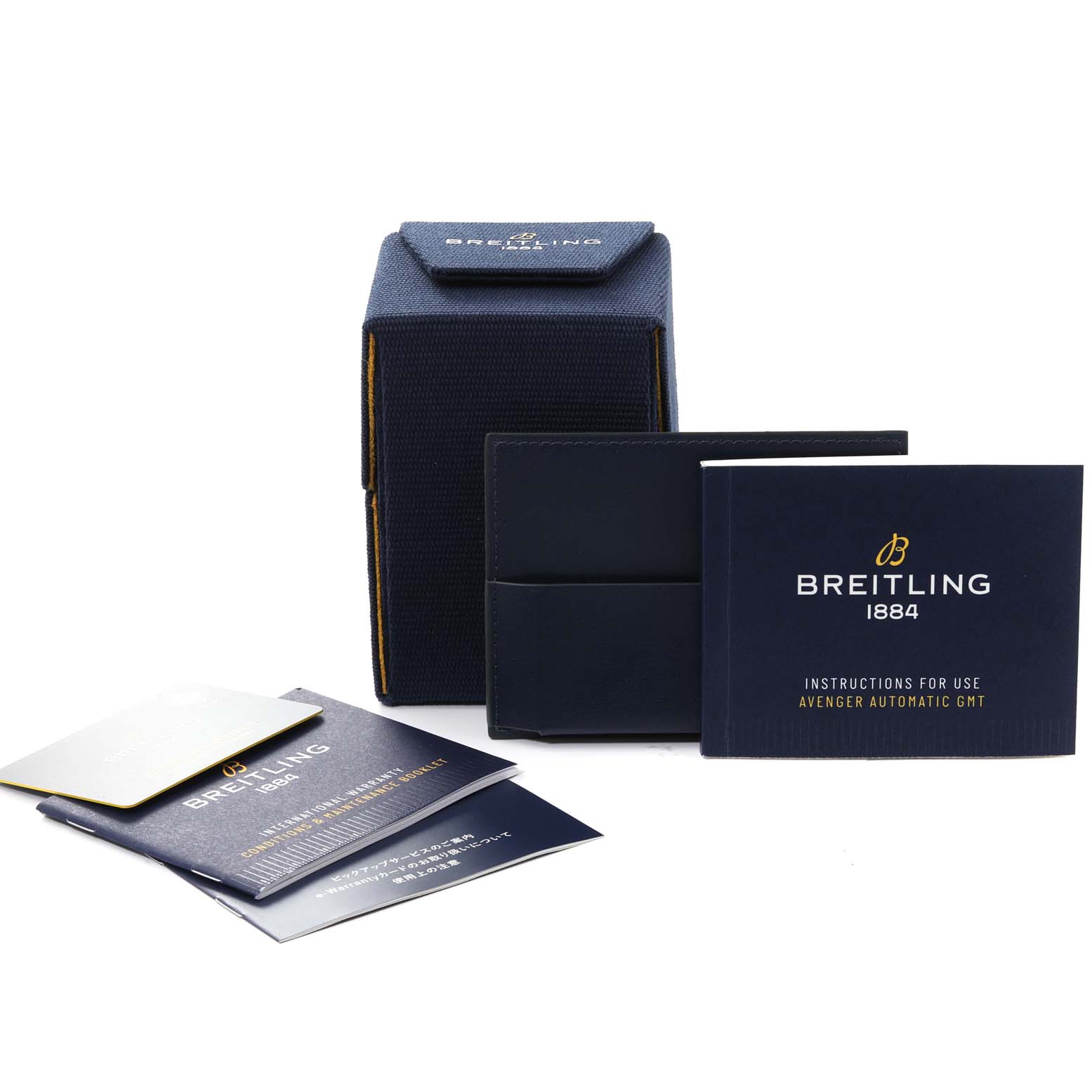 The image shows the packaging and instruction manuals for the Breitling Avenger A32395 Men's Stainless Steel Blue Dial A32395 Men's Stainless Steel Blue Dial model watch with the brand name prominent on the box and booklets.