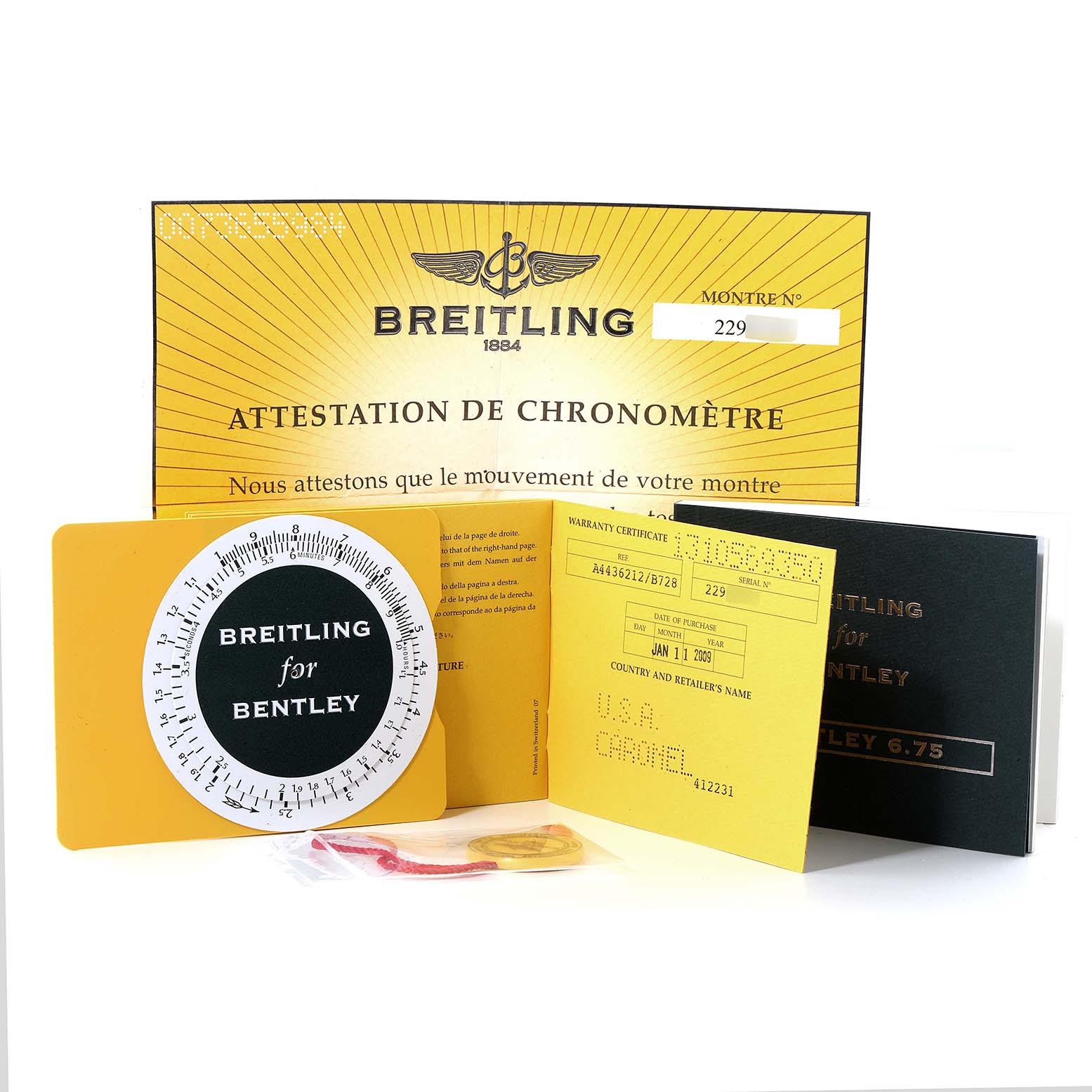 The image shows the documents and accessories for a Breitling Bentley A44362 Men's Stainless Steel Black Dial A44362 Men's Stainless Steel Black Dial watch, including certificates and manuals.