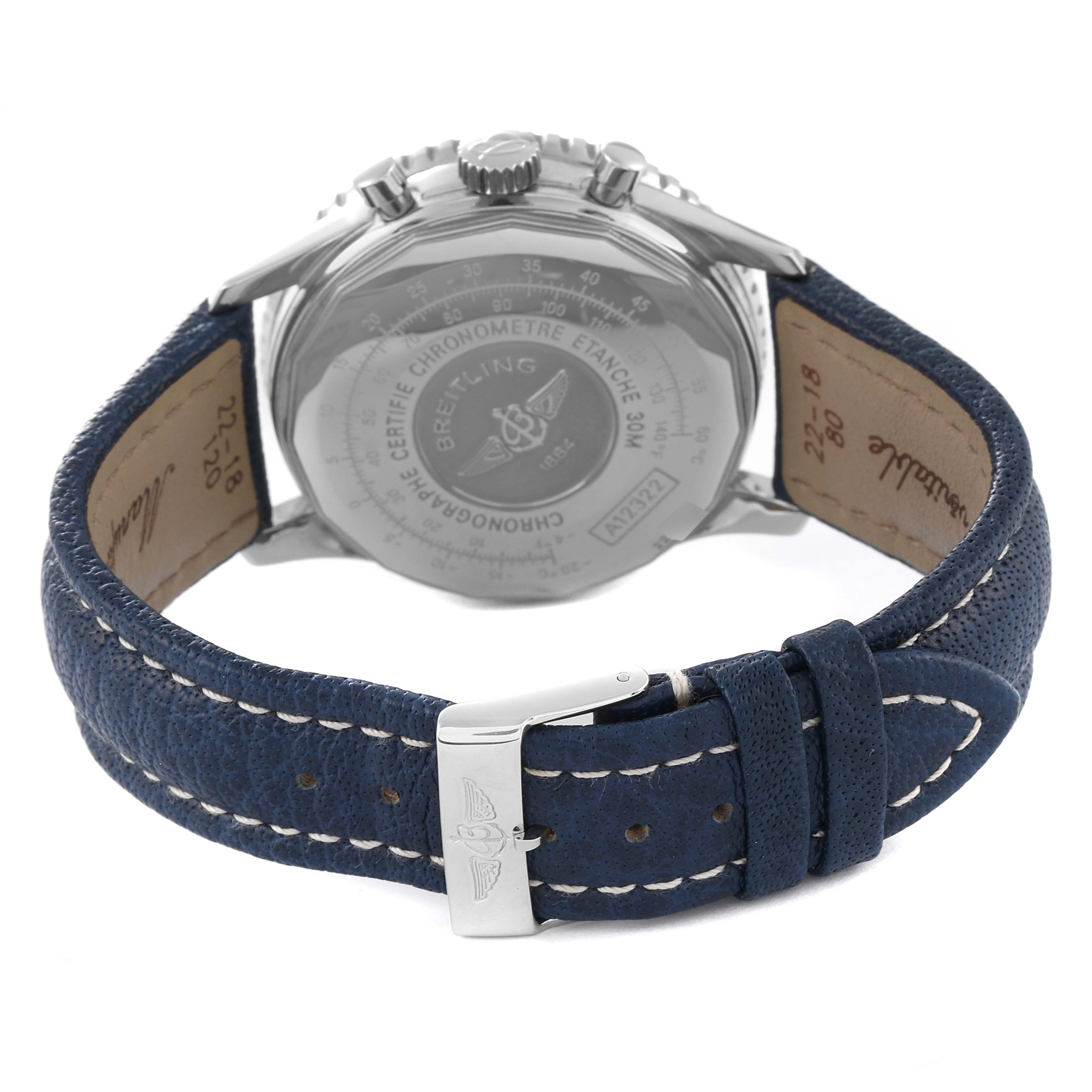 The image shows the back view of a Breitling Navitimer A12322 Men's Stainless Steel Blue Dial A12322 Men's Stainless Steel Blue Dial watch, displaying its case back, crown, chrono pushers, and blue leather strap.