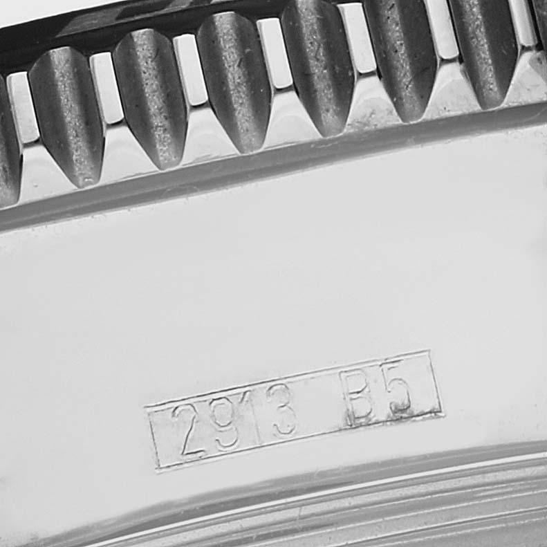 This image shows the engraved model number and part of the notched bezel of a Breitling Superocean A1736402/BA31 Men's Stainless Steel Black Dial A1736402/BA31 Men's Stainless Steel Black Dial watch.