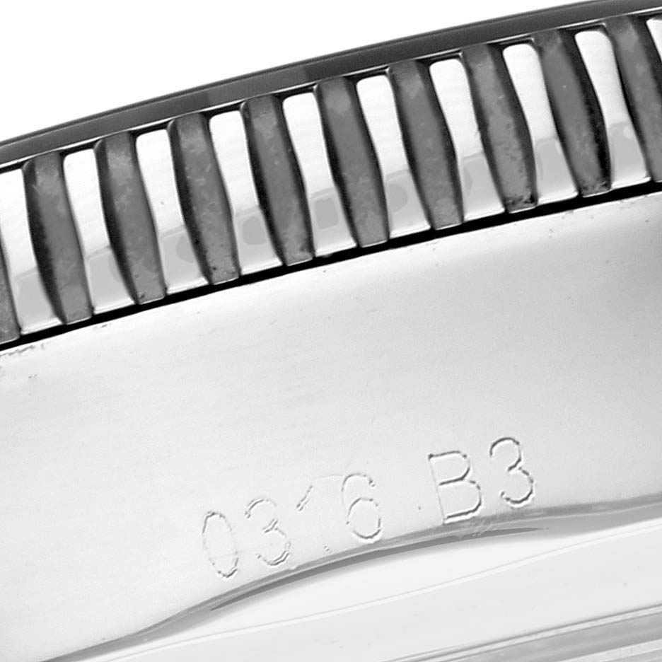 Close-up view of the bezel and engraved case edge of a Breitling Superocean A1732024/B868 Men's Stainless Steel Black Dial A1732024/B868 Men's Stainless Steel Black Dial watch.