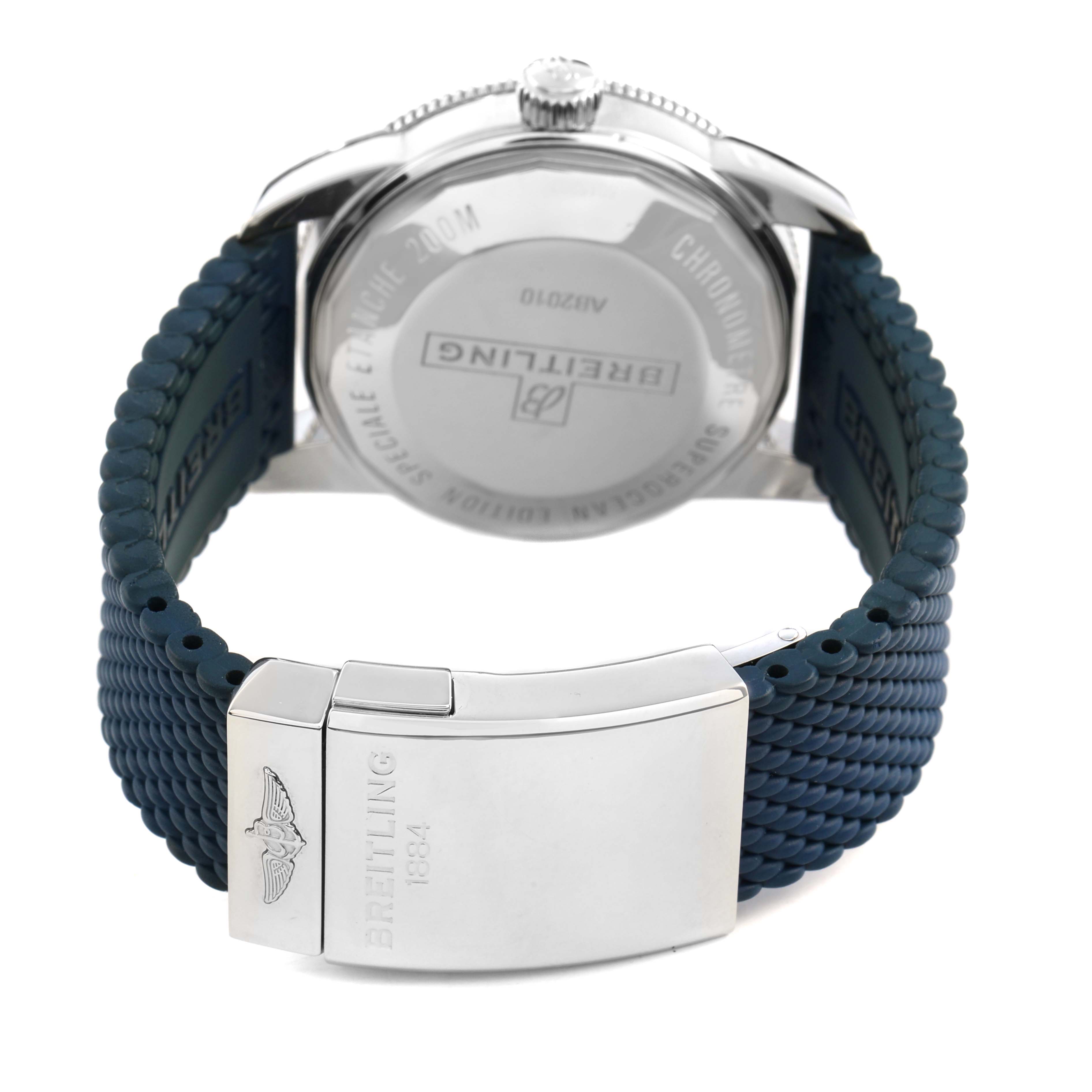 The image shows the back view of a Breitling Superocean AB2010 Men's Stainless Steel Silver Dial watch, featuring its clasp and blue textured strap.