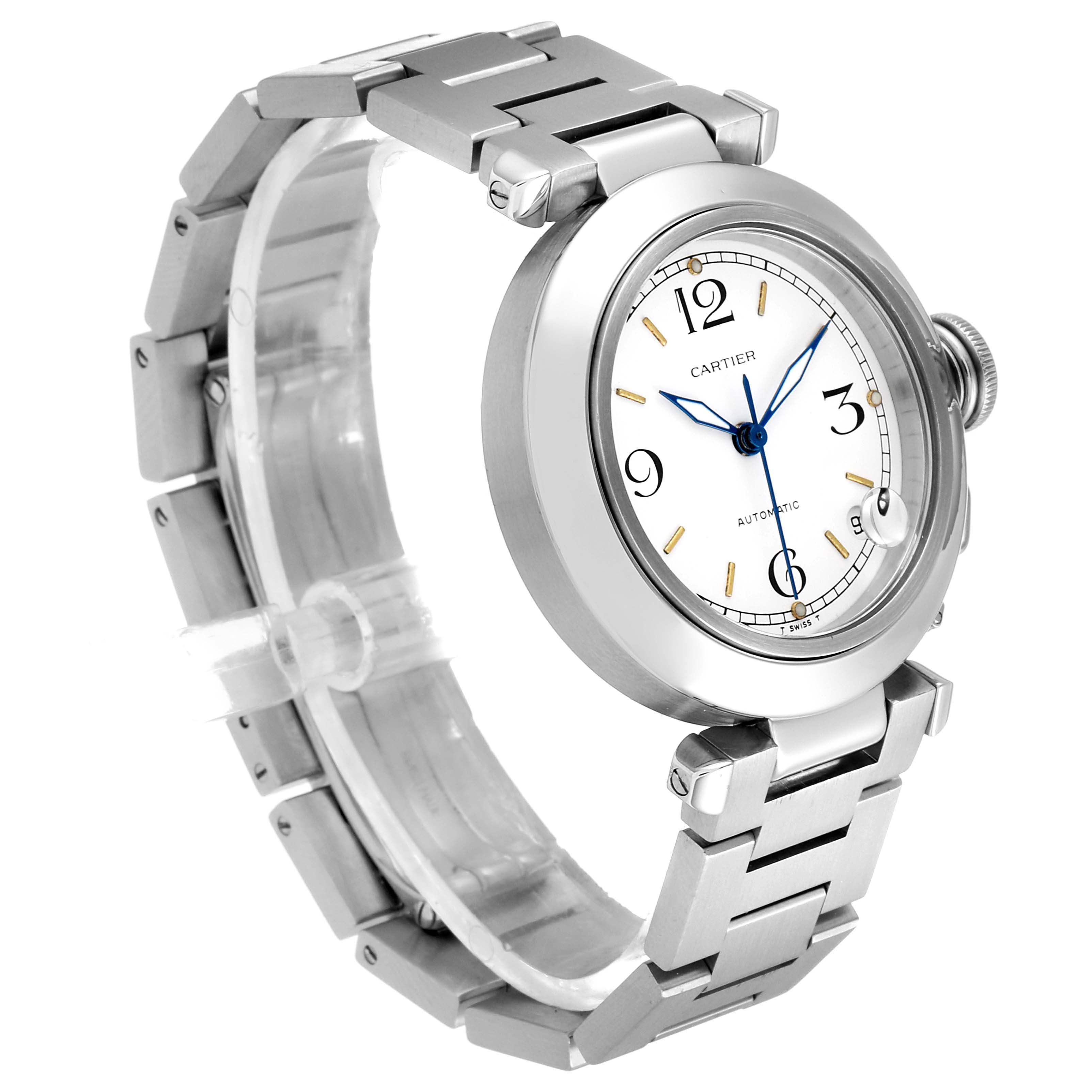 The image shows a side angle view of the Cartier Pasha W31044M7 Men's Stainless Steel White Dial W31044M7 Men's Stainless Steel White Dial watch, highlighting its stainless steel bracelet and round dial with blue hands.