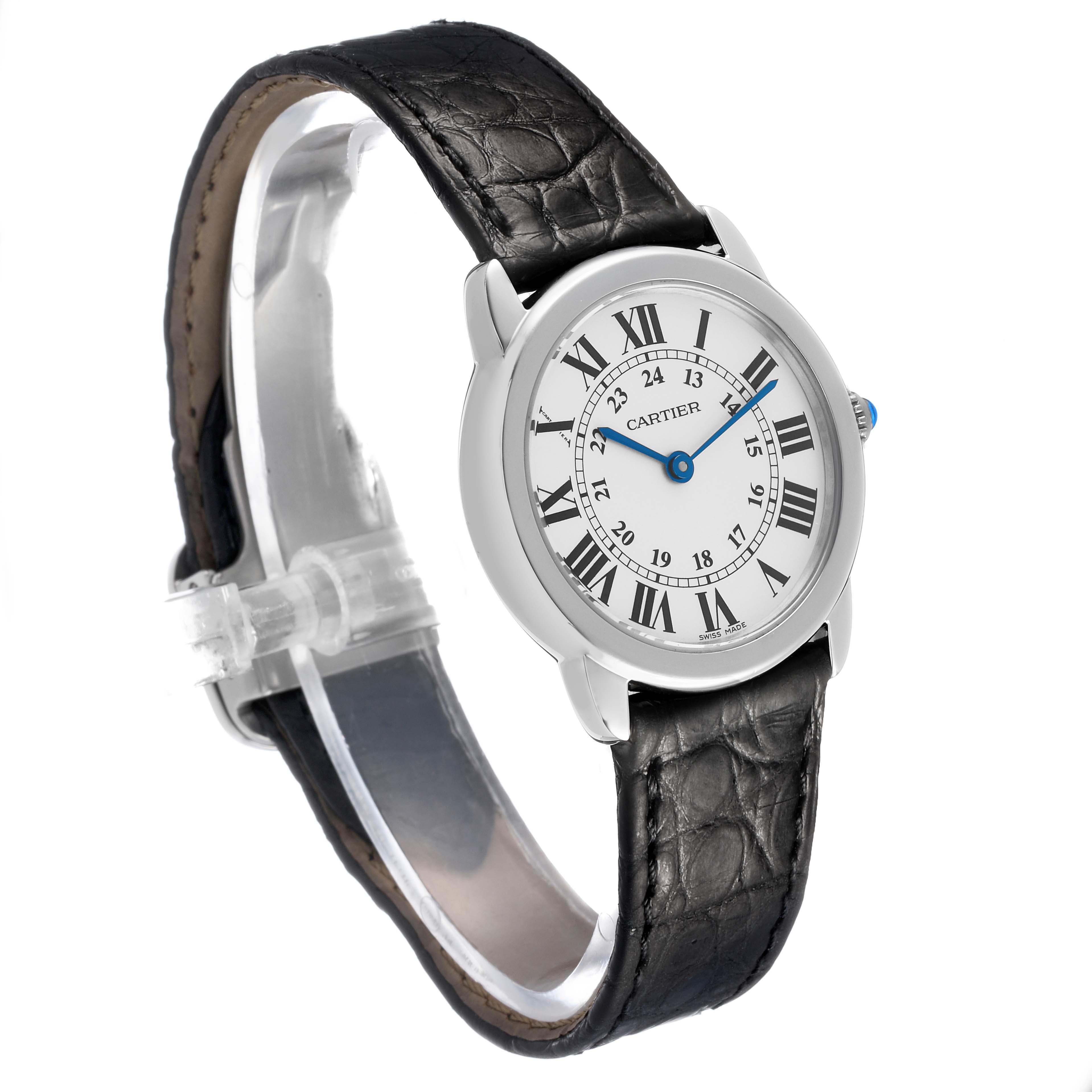 The Cartier Ronde W6700155 Women's Stainless Steel Silver Dial watch is shown at a three-quarter angle, displaying the face, Roman numerals, strap, and blue gemstone crown.