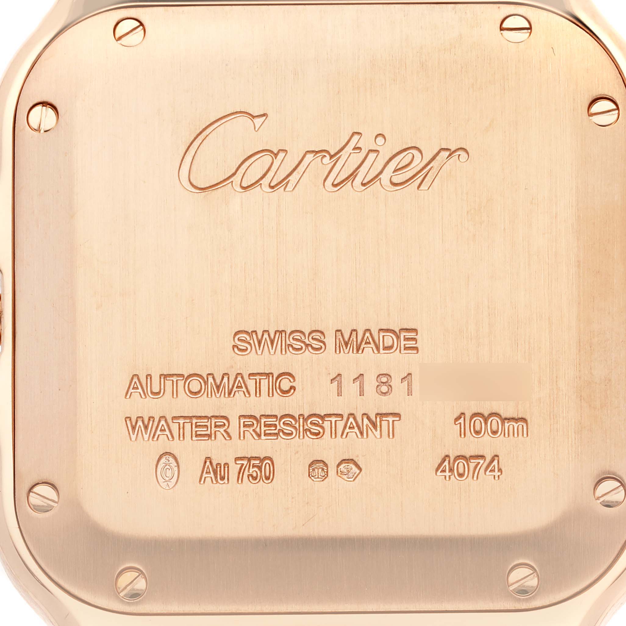The image shows the back case of a Cartier Santos WGSA0028 Men
s Rose Gold Silver Dial WGSA0028 Men
s Rose Gold Silver Dial watch, highlighting its engraved specifications and brand name.